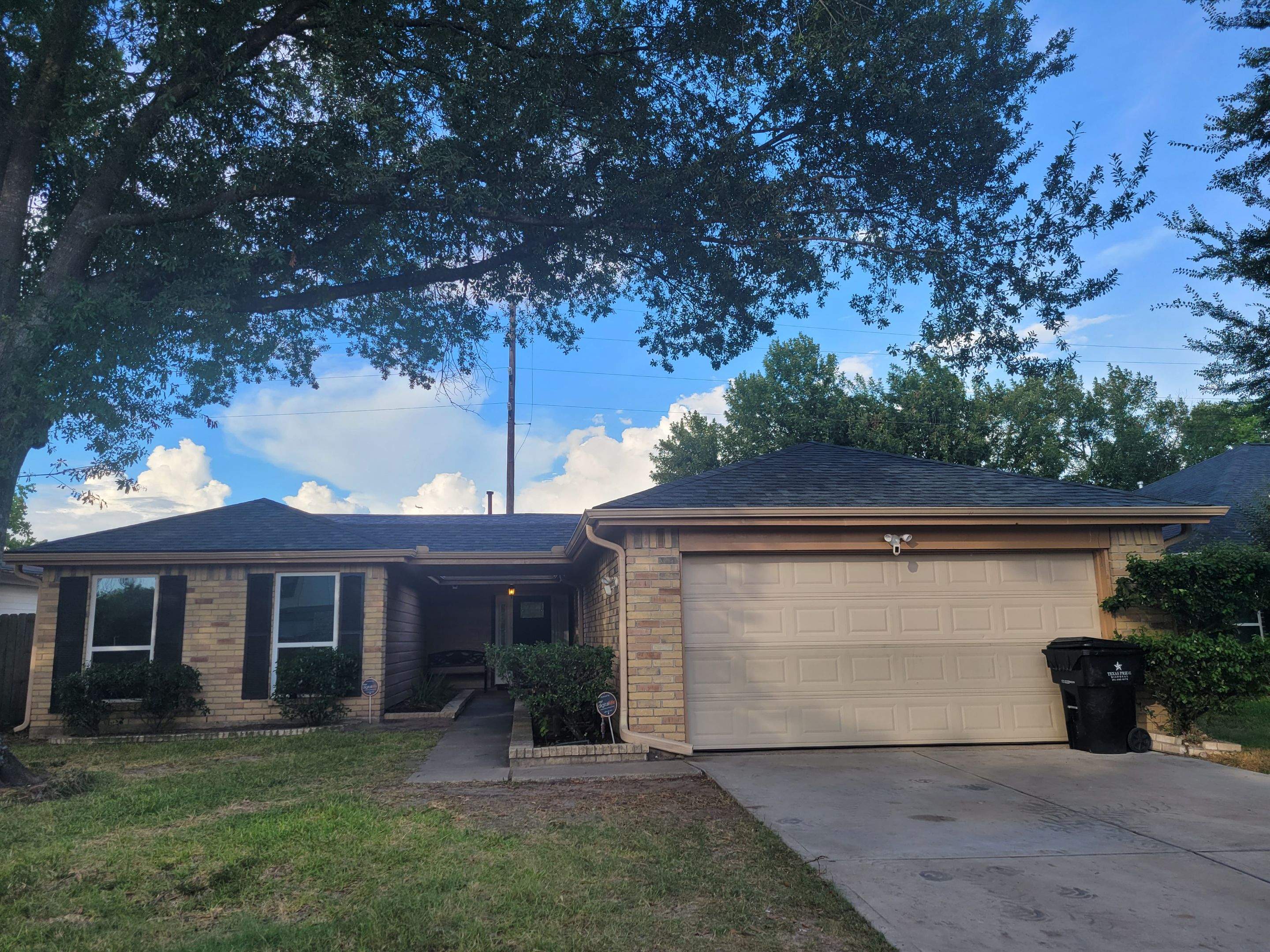 IKO Charcoal Gray Shingle Roof Replacement — Houston, TX by PL Roofing & SB Roofing, LLC.