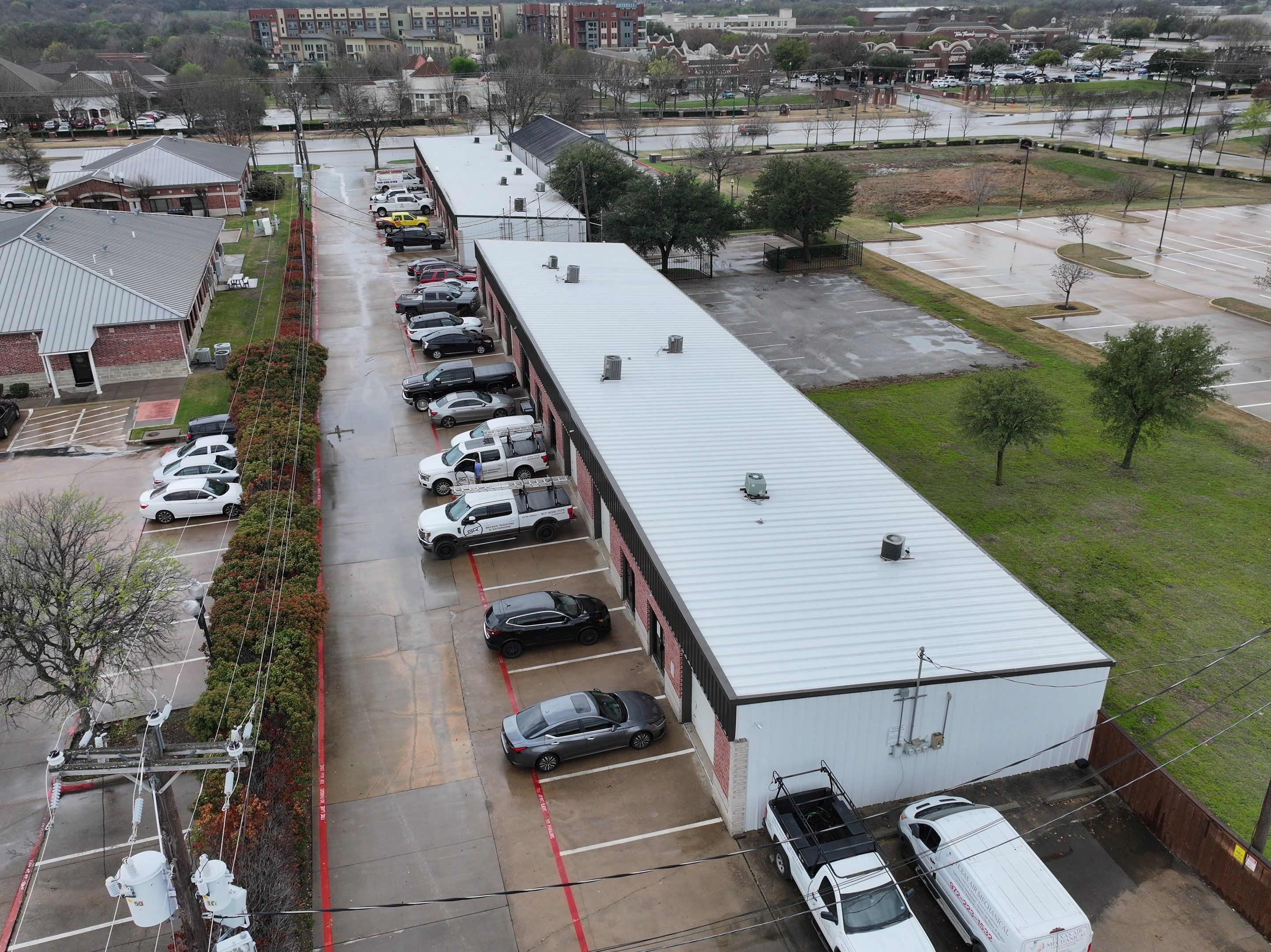 Commercial Roofing Installation using Double lock Mechanical Standing Seam Metal by Becker Roofing and Exteriors