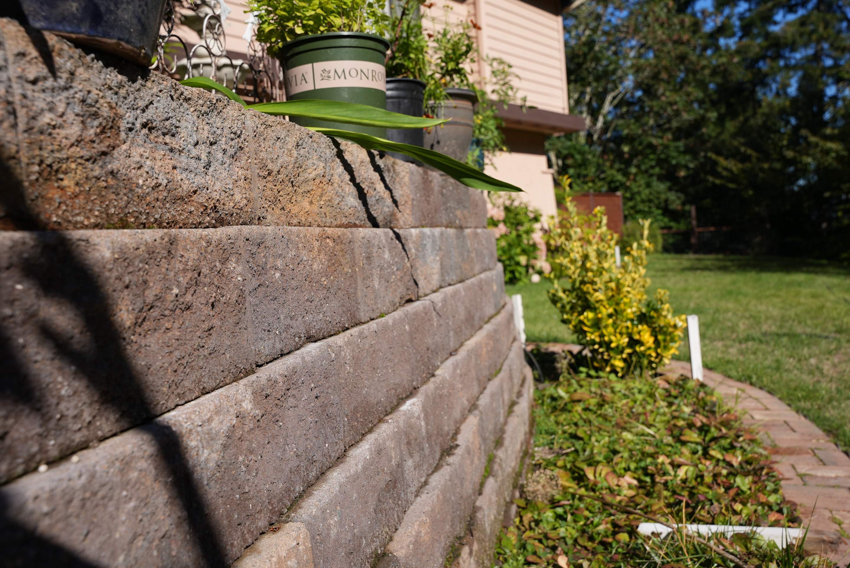 Mehta | Tiled Driveway with Sealer & Retaining Wall  by Jireh Asphalt & Concrete Inc 