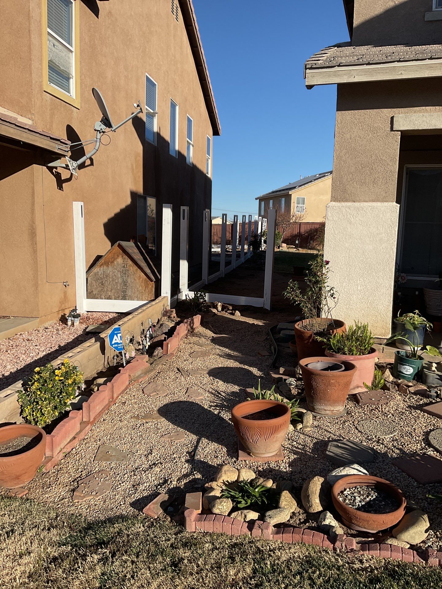 Fence installation using wood by Fence Guys Inc.