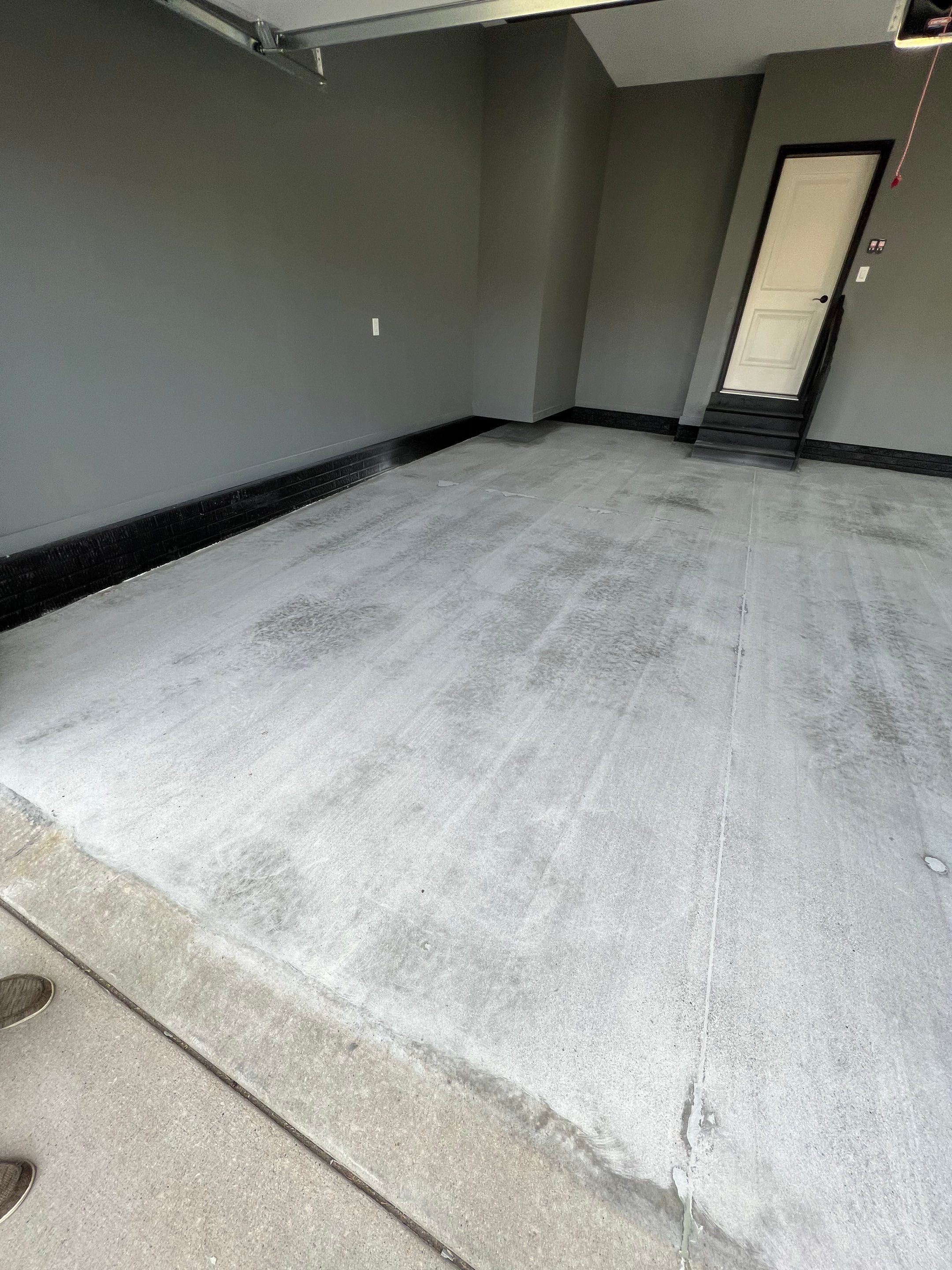 Garage painting and new floor by Cutting edge painting 