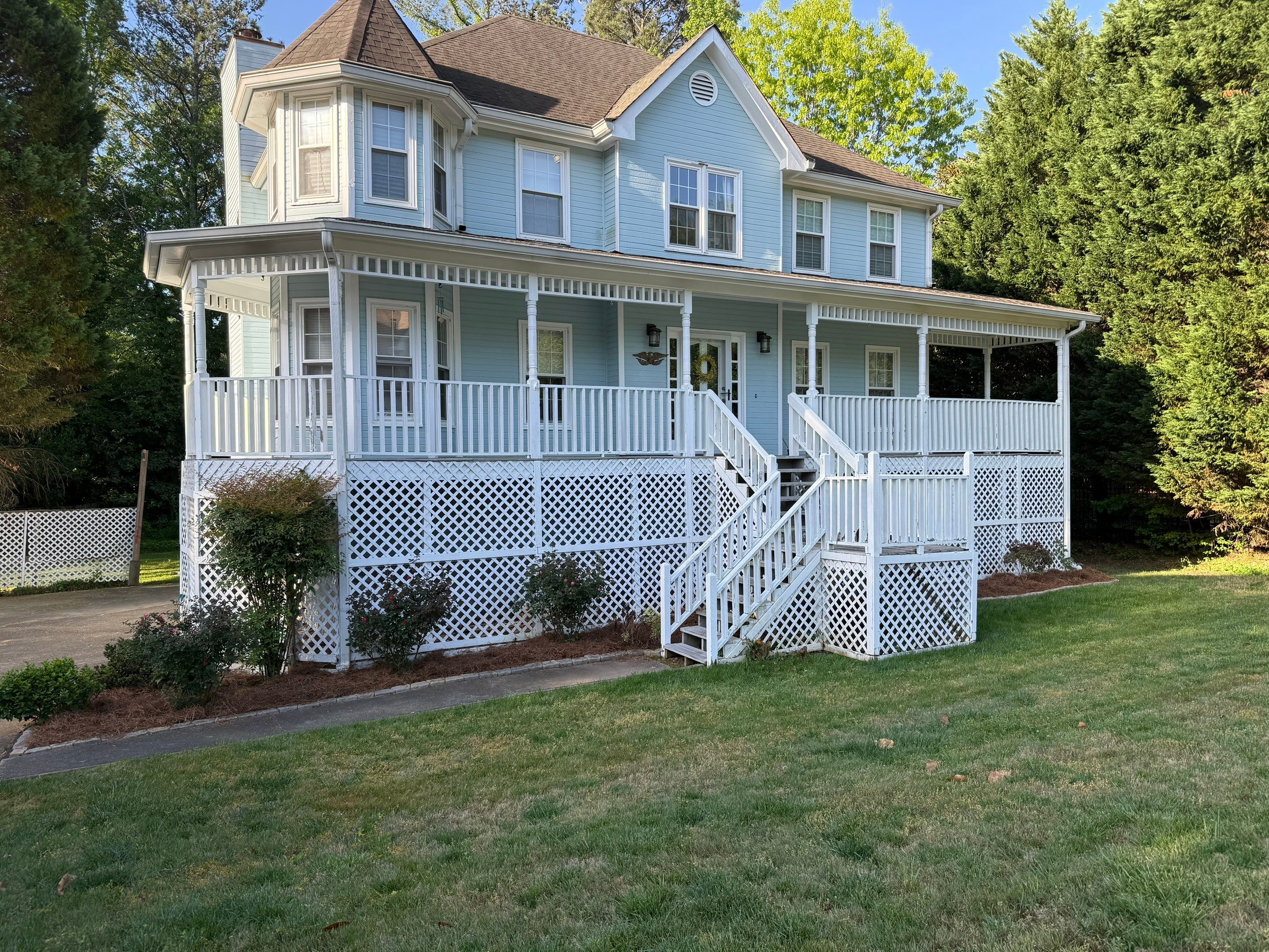 Marietta Porch Upgrade with Horizontal Pressure-Treated Wood Slats by Swift Home Renovations
