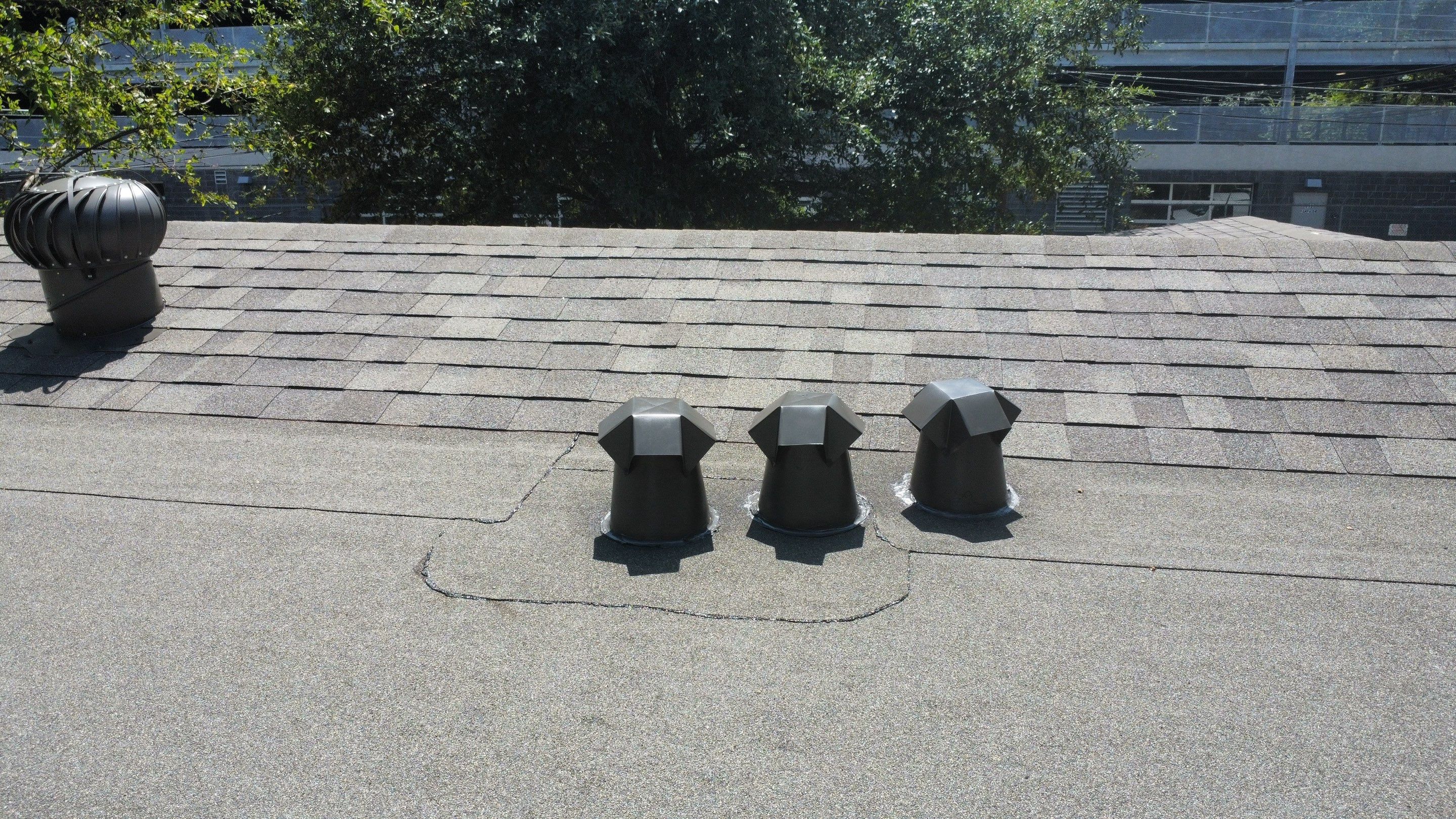 Mixed Roof System ā Oakridge Driftwood + Flat Roof Section | Austin, TX by Kstylez Roofing & Construction