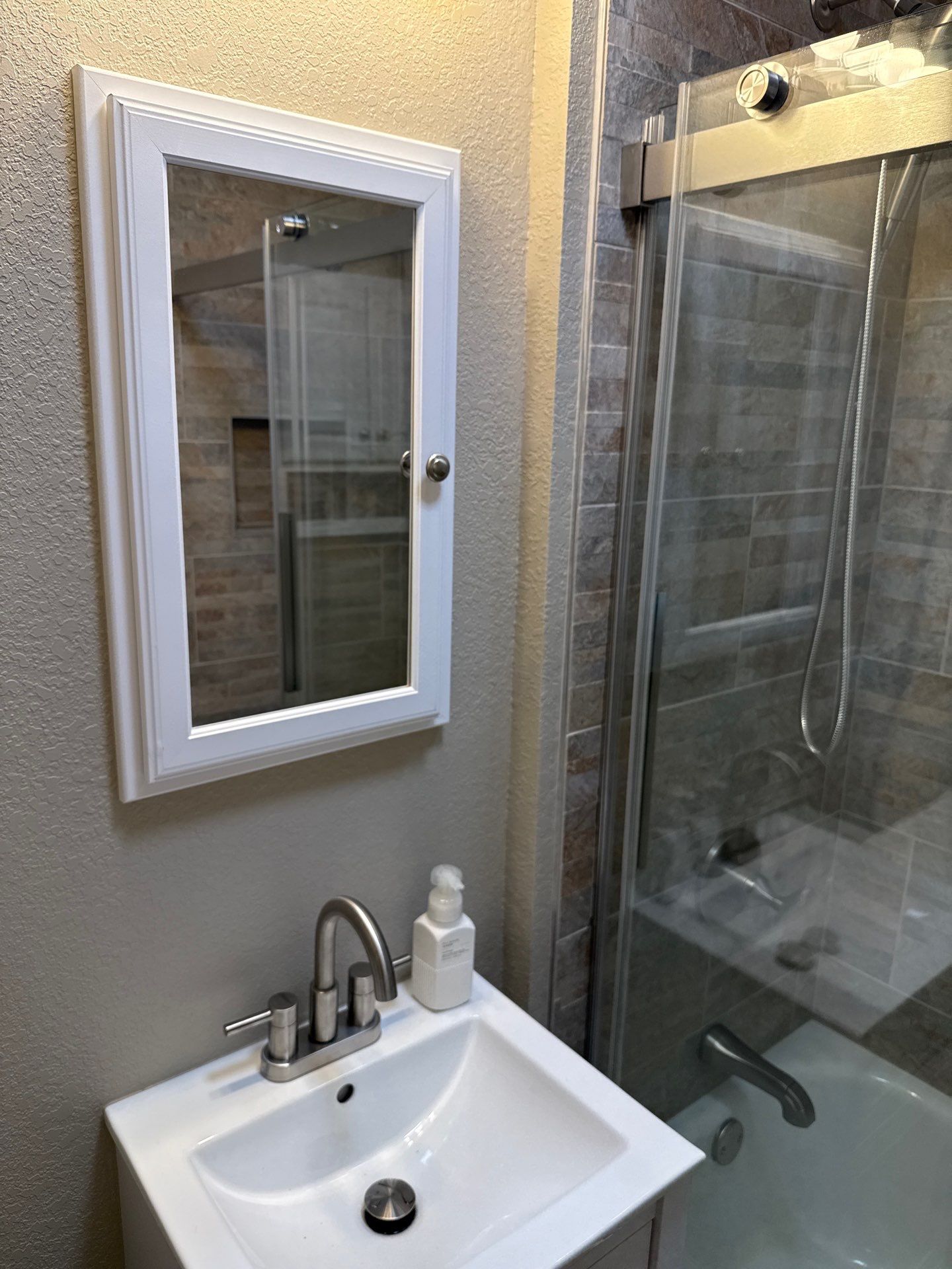Beautiful Bathroom Remodel by In & Out Construction & Remodeling, LLC