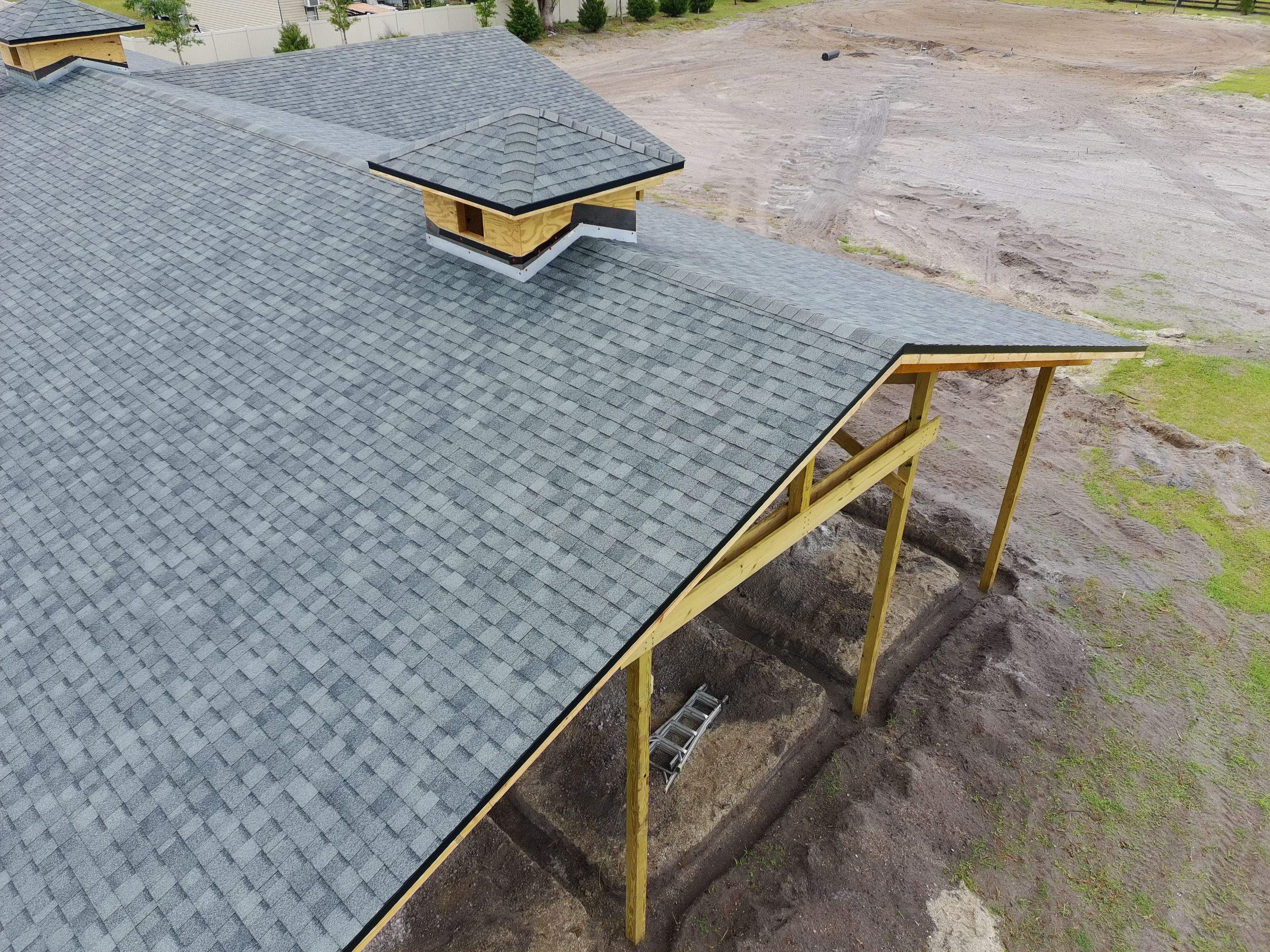Custom Post-Frame Horse Barn and Shingle Roof Installation in Geneva by Fortified Roofing Solutions Corp.