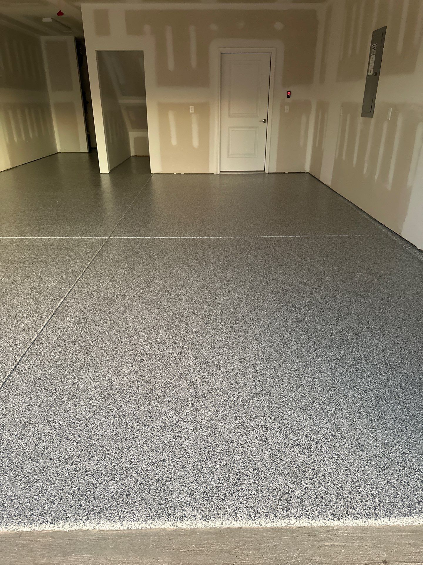 Garage Floor Coating using Gravel by My Garage Floor Guys
