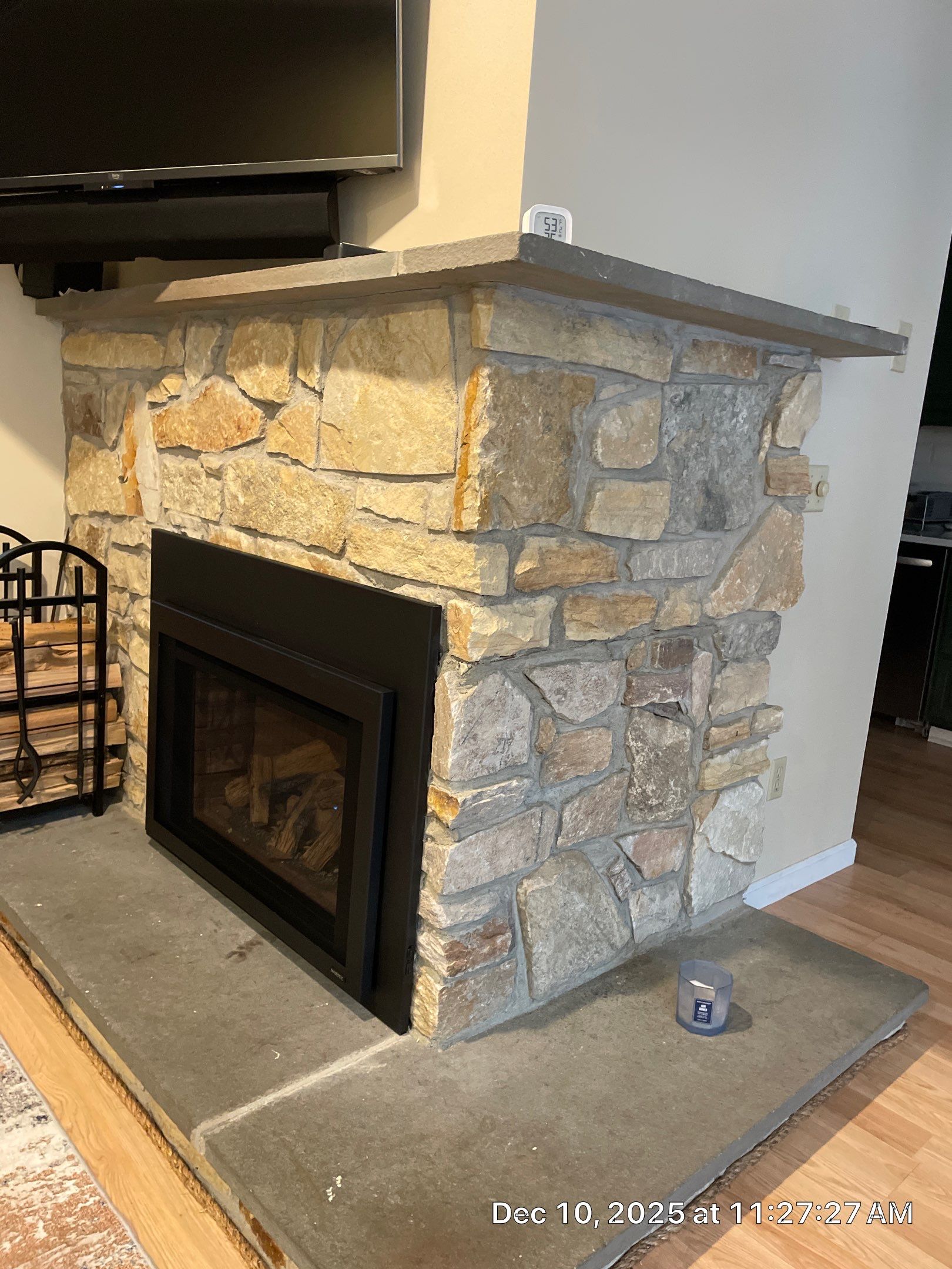 Gas Insert in corner fireplace by Neighborhood Chimney Services 