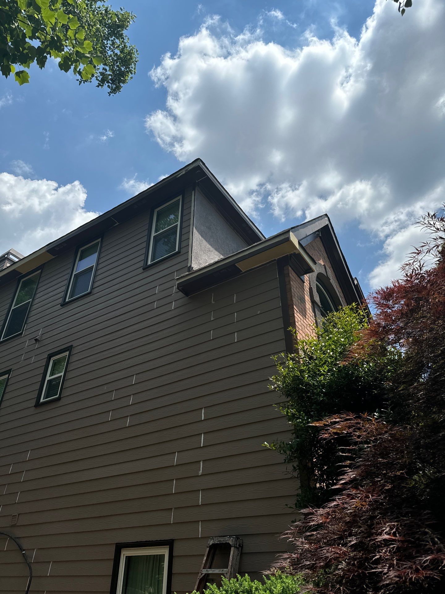 Full Exterior Painting and Gutter Replacement for Powder Springs Home by Swift Home Renovations