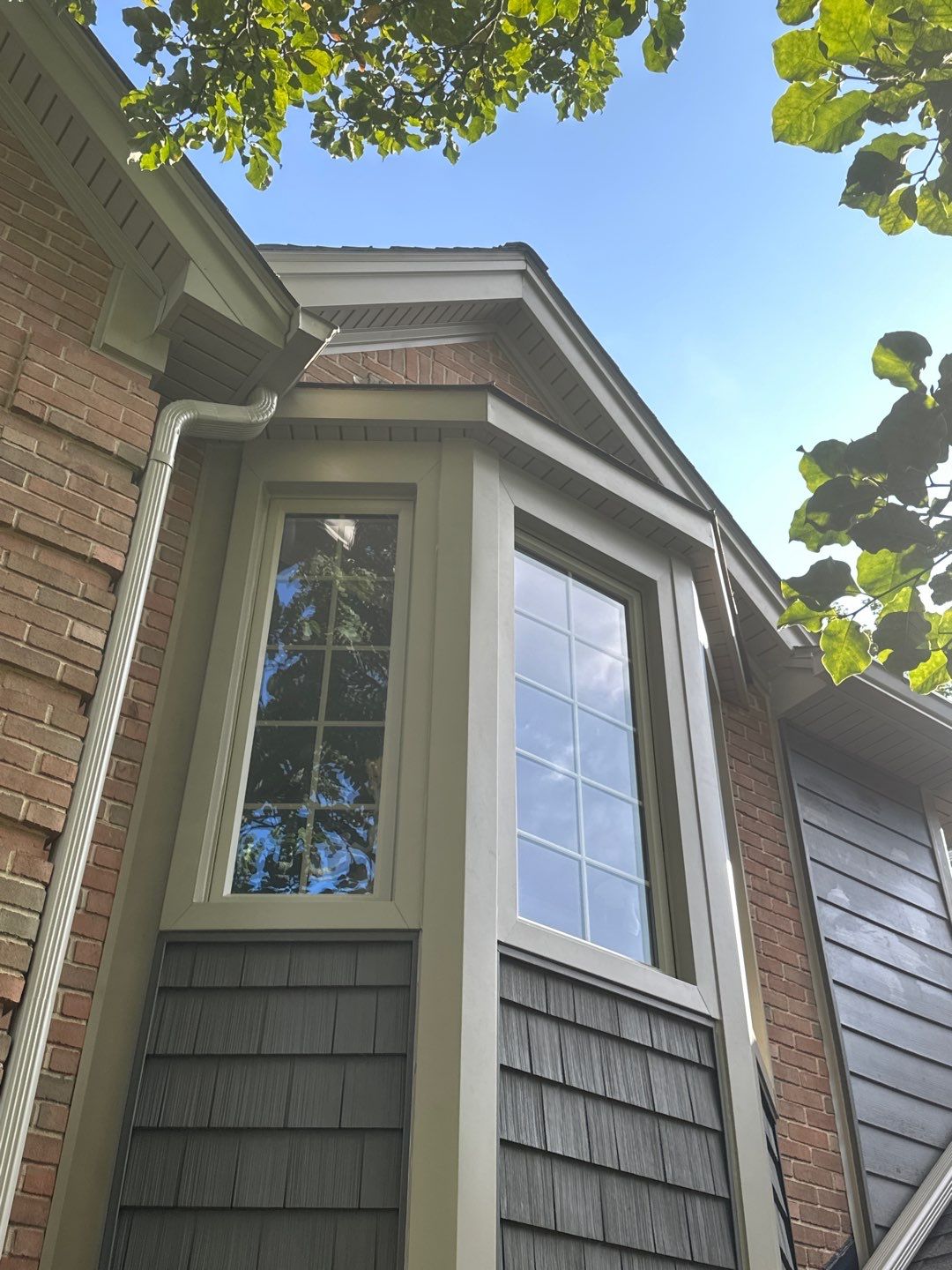 Roof Replacement using Owens Corning Peppercorn and Siding Replacement using Ascend Charcoal Smoke by 180 Contractors