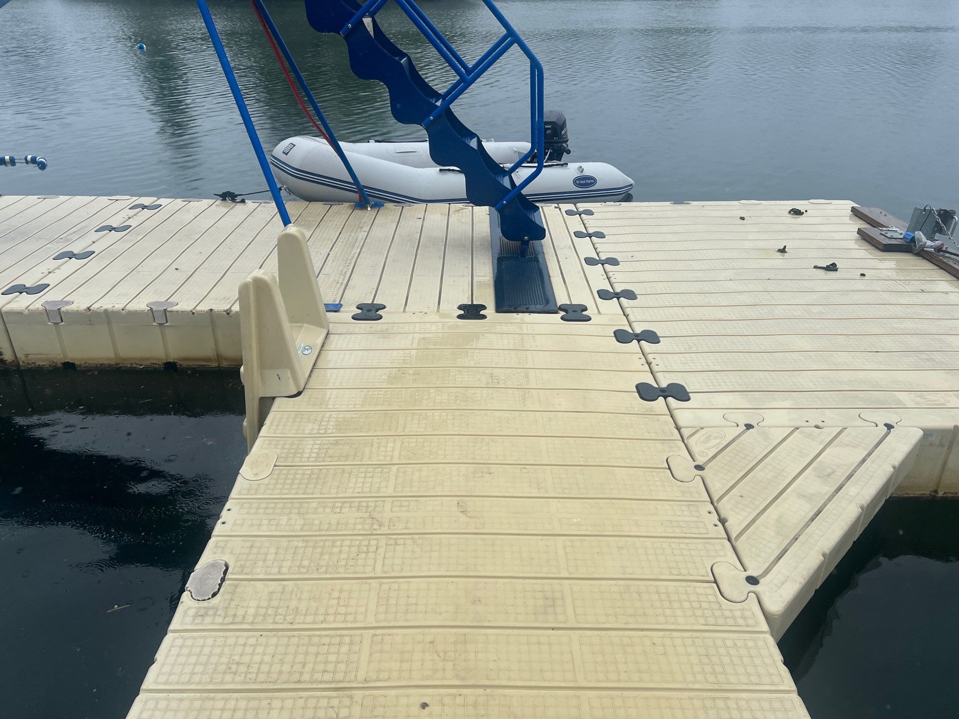 Power washing of floating dock by Northern Power Washing LLC.