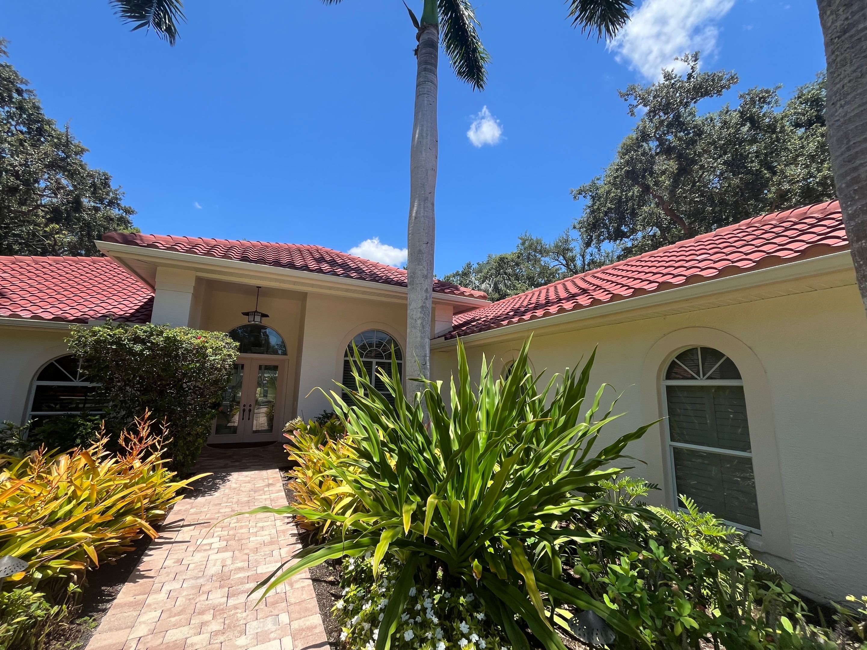 Splash Guard Gutters for Rainy Season Protection in Osprey FL by Gutter Professors