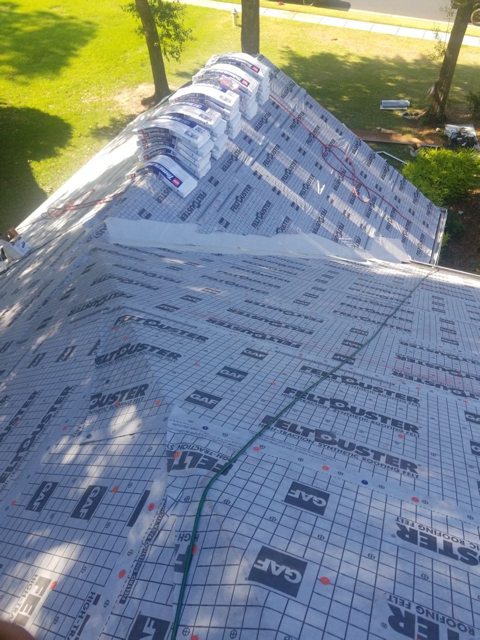 Residential Roofing Installation using Roof Replacement by American Roofing & Construction LLC