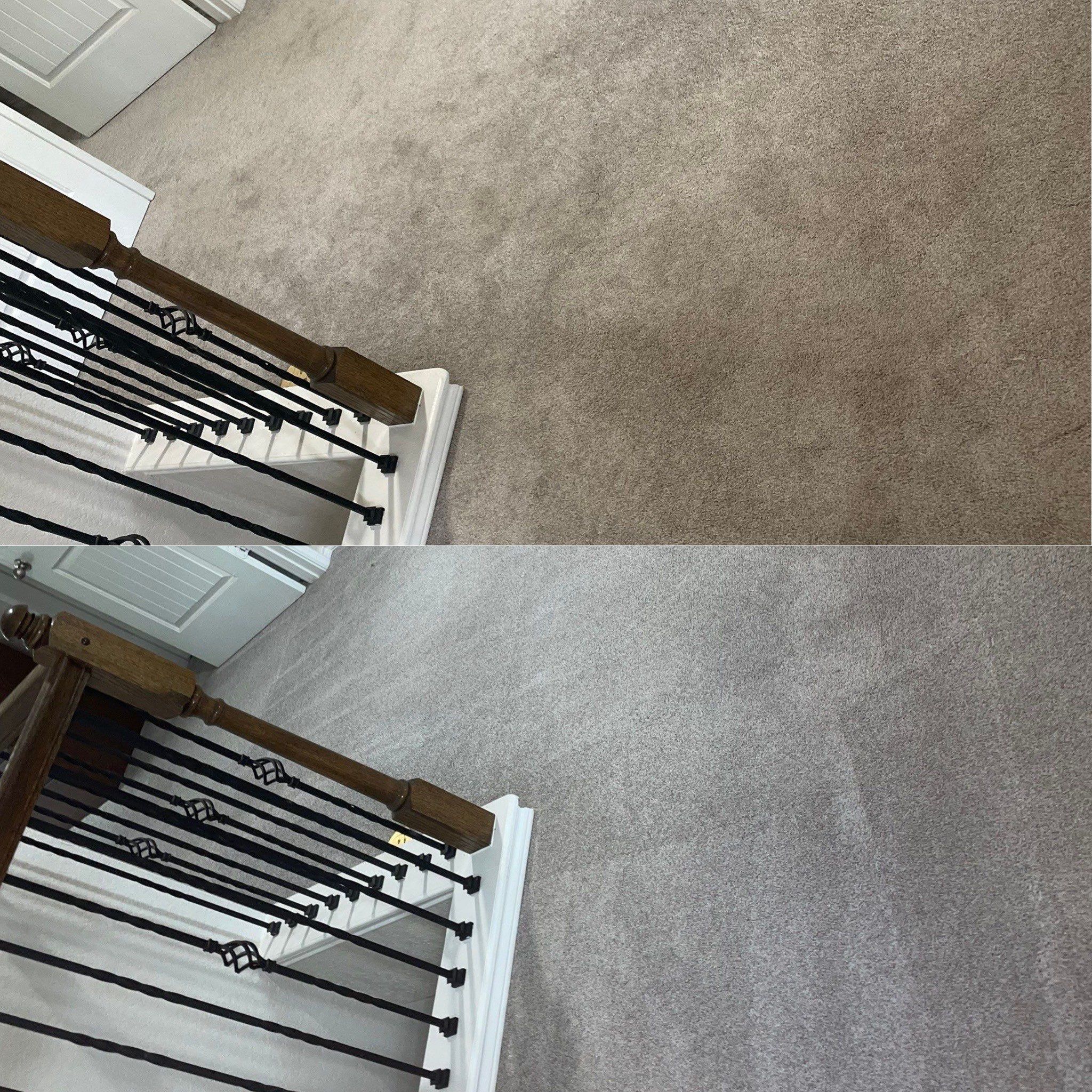 cleaning and refreshing carpeted floor sections in a residential staircase landing area