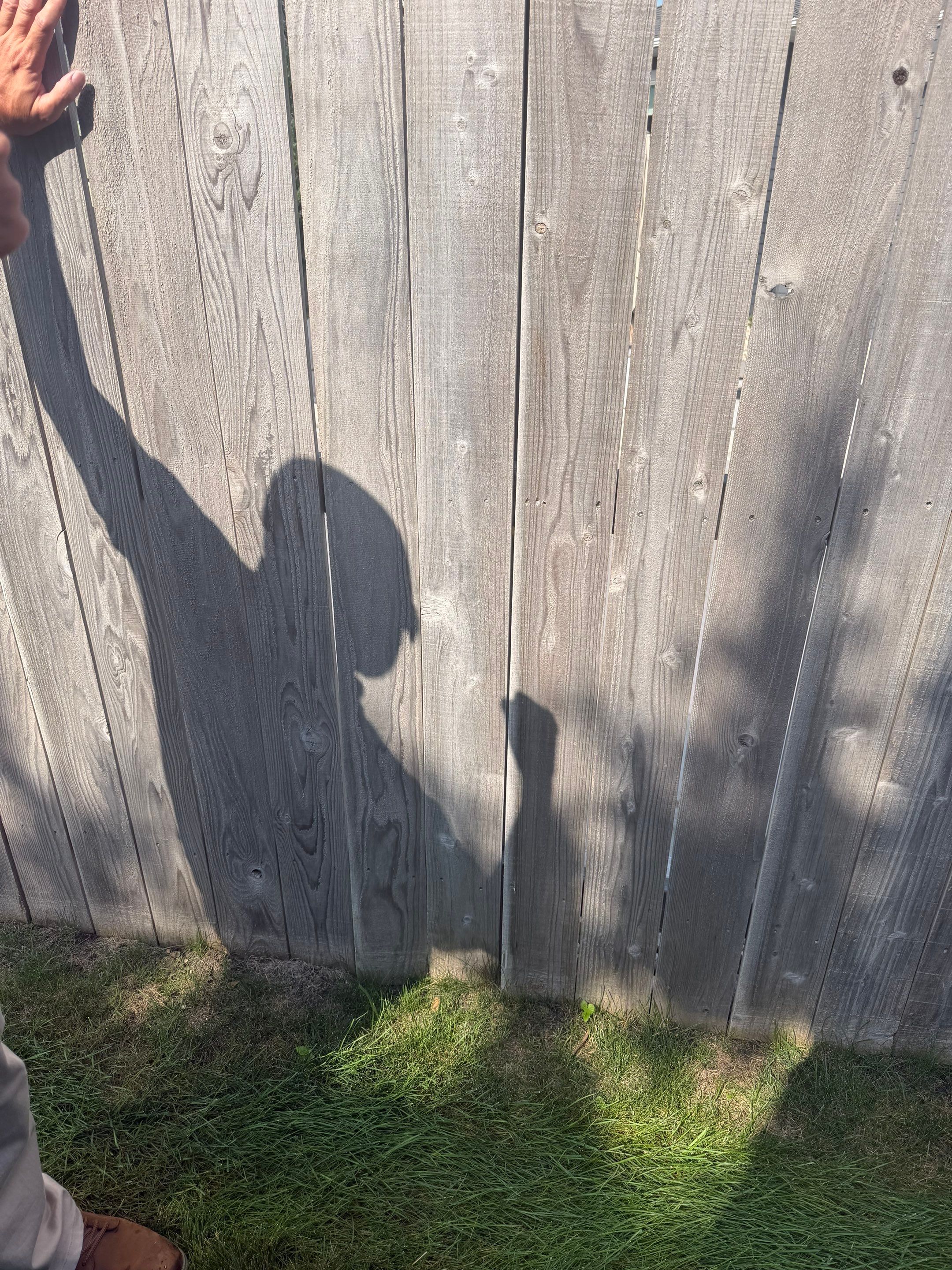 Custom Privacy Fence and Paver Patio Installation in Sioux Falls by Select Painting, Coatings & Garage Cabinets