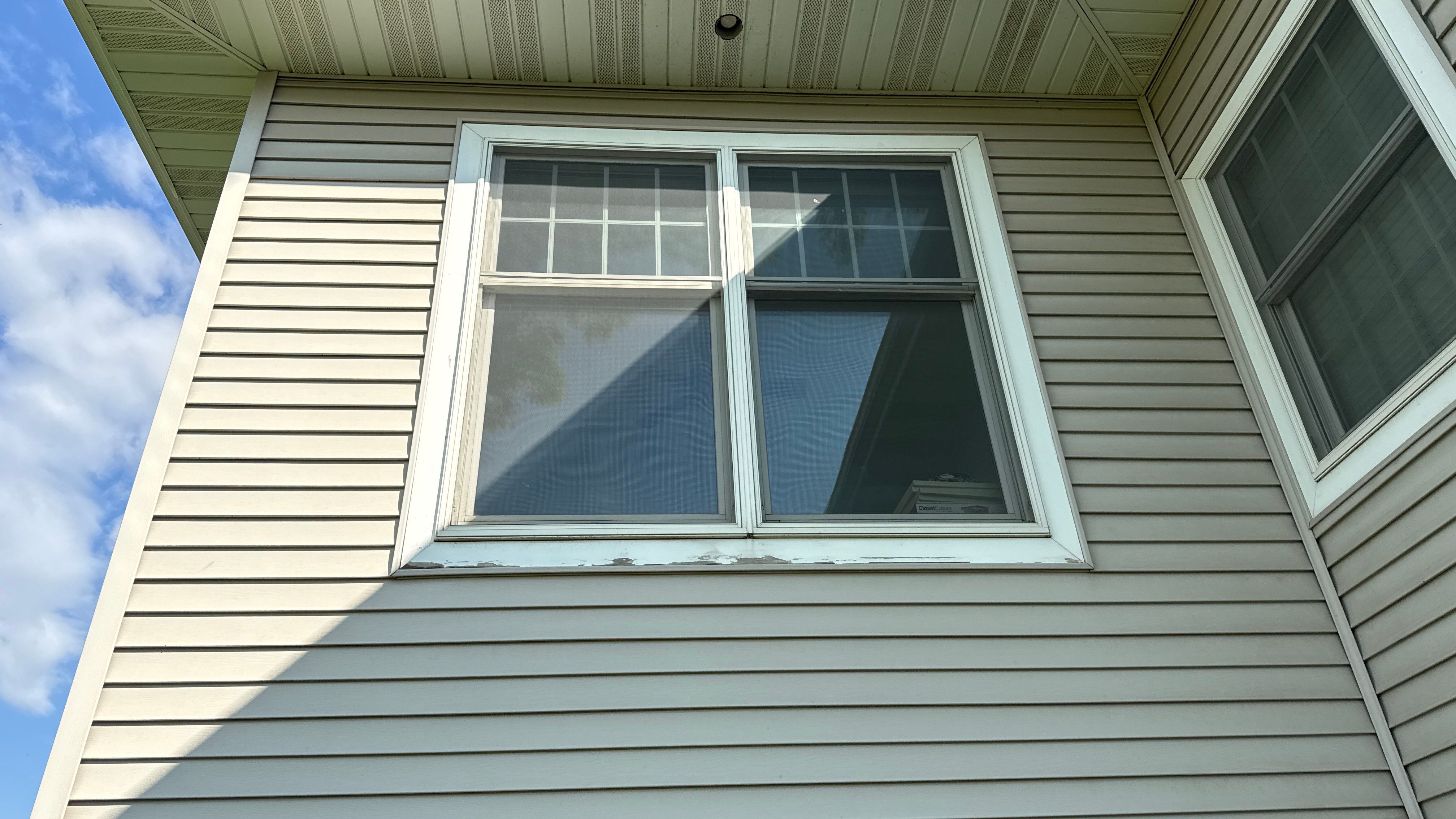 Replacing Old Windows with Hawthorn Vinyl Windows by United Windows and Siding LLC