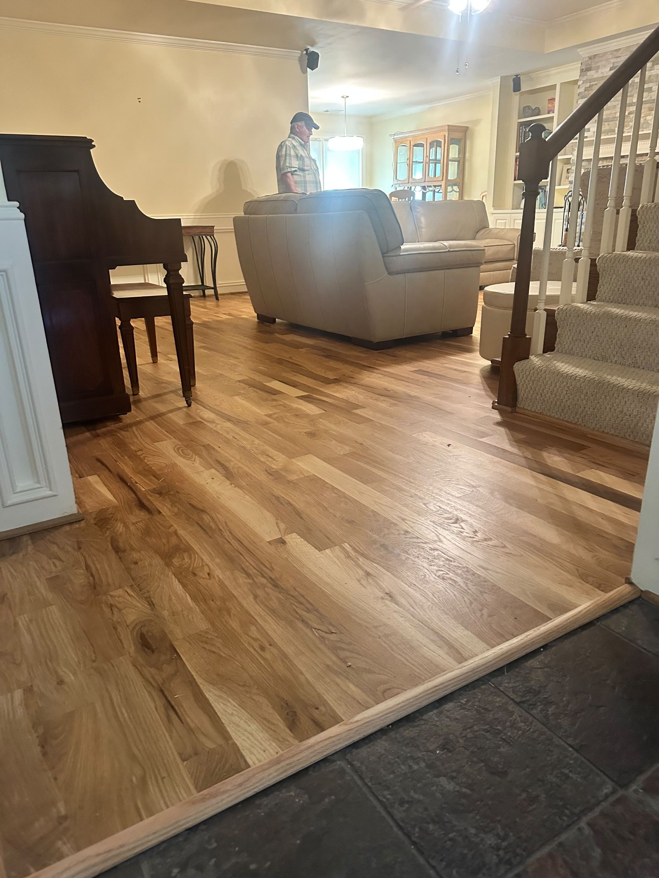 Natural Oak Hardwood Flooring Installation and site on finish Throughout Roswell Home by Flooring Xpress CO 