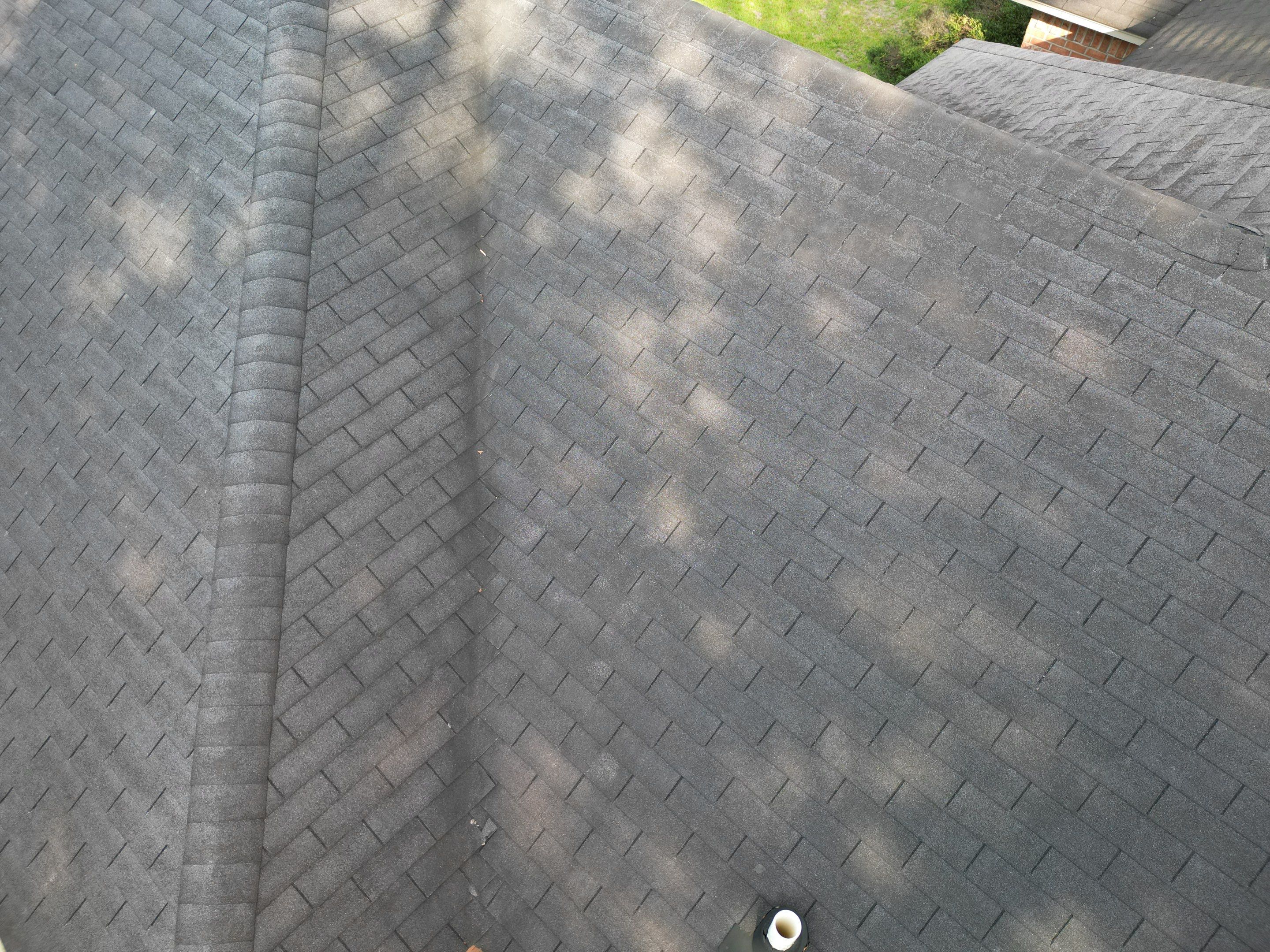 Residential Roofing Installation using Benton 26Ga 1inc Snapcock Metal Roof KYNAR Matte Black by Talya Roofing