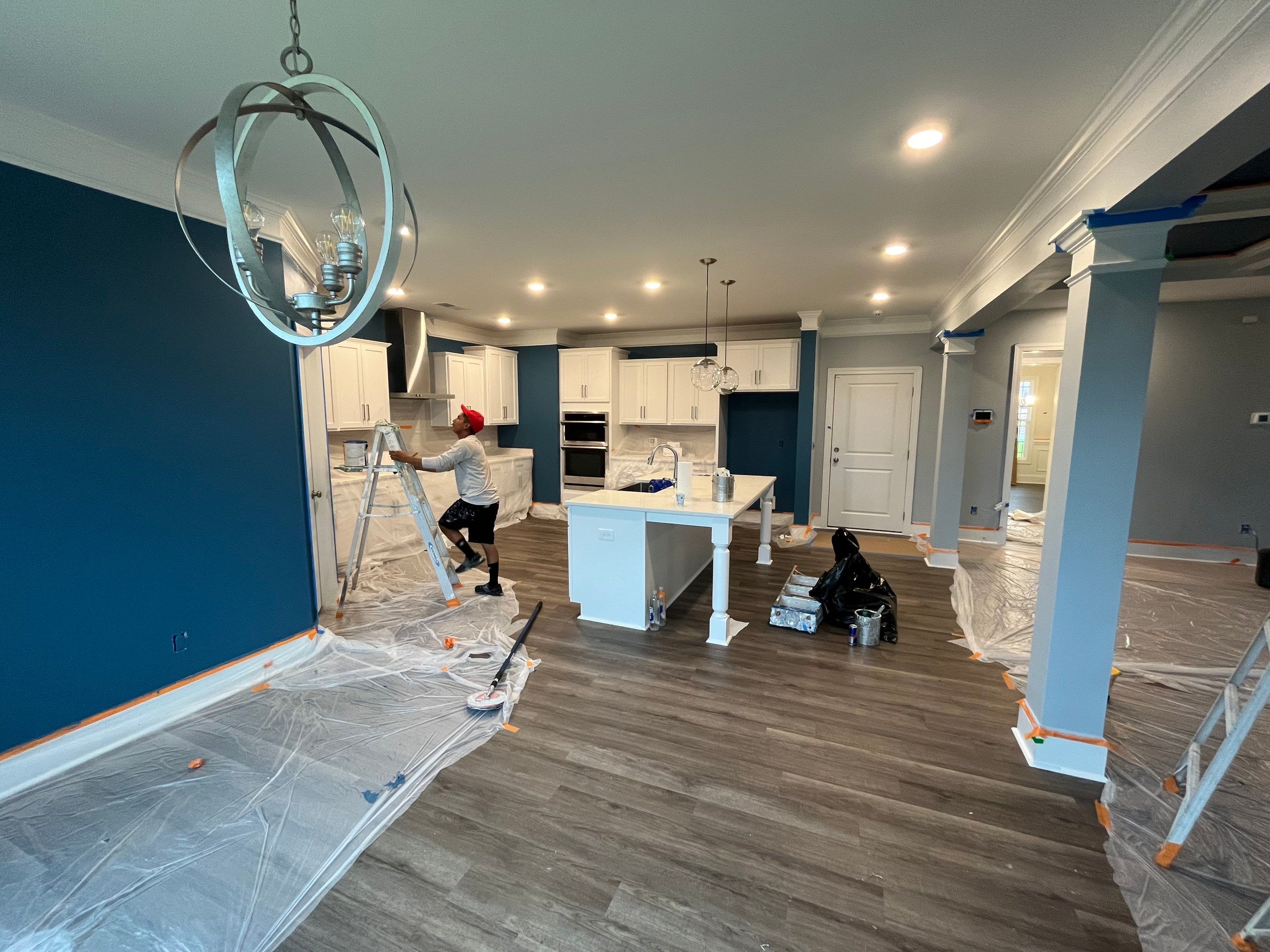 Interior Paint and Bamboo Flooring Install by Thompson Industrial
