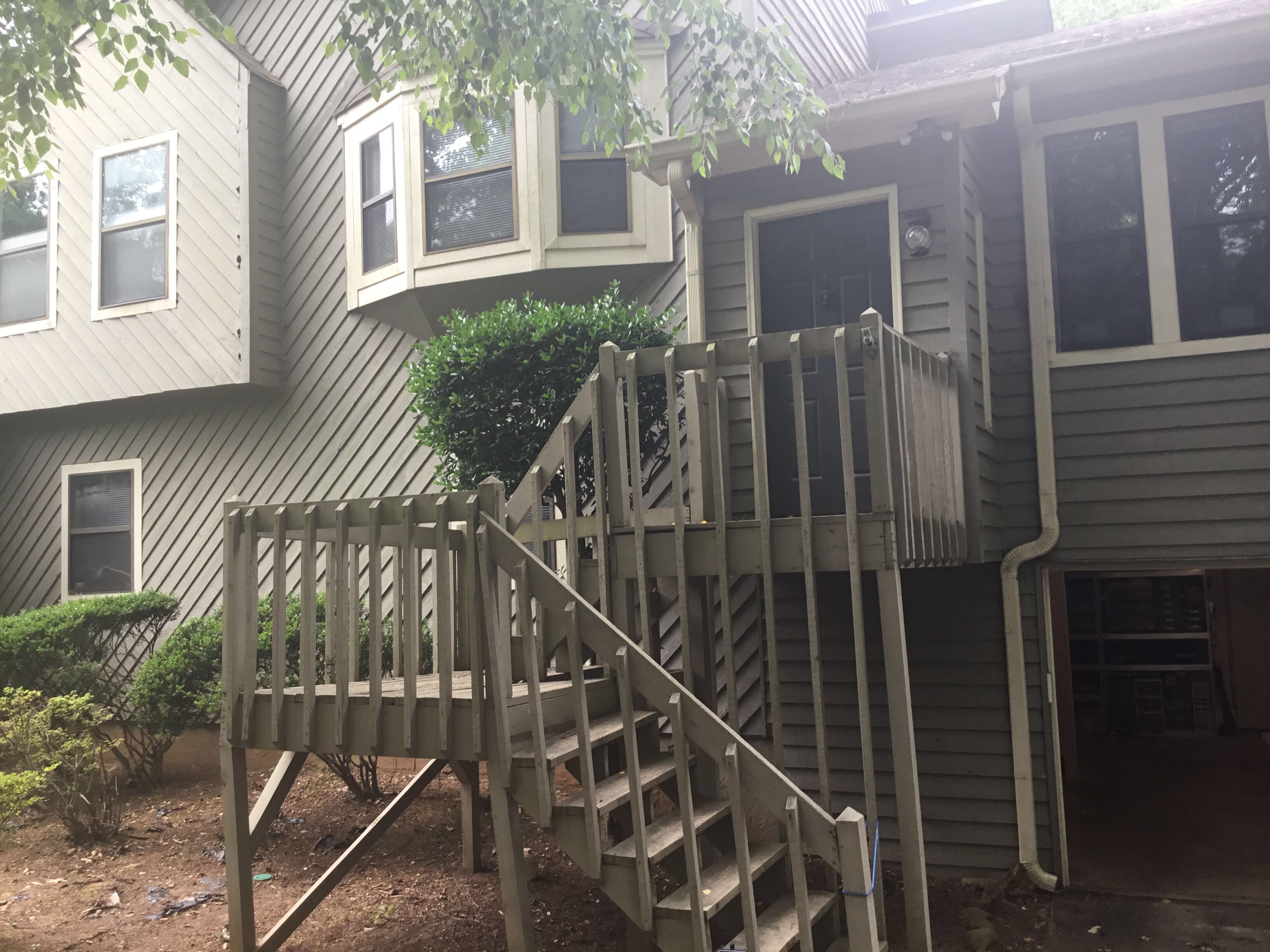 Elevated Wooden Deck and Front Porch Renovation in Marietta by Swift Home Renovations 