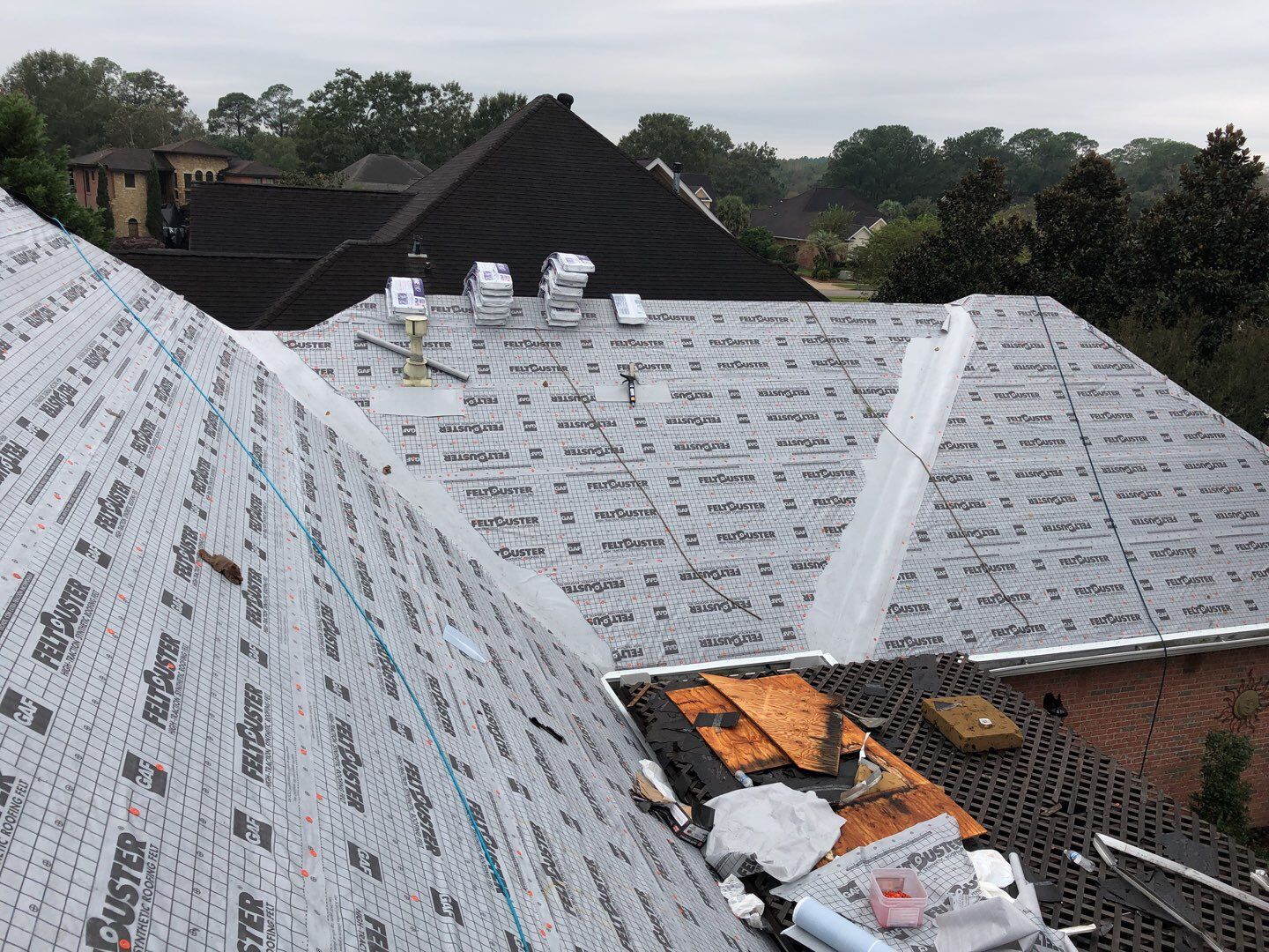 Residential Roofing Installation using Roof Replacement by American Roofing & Construction LLC