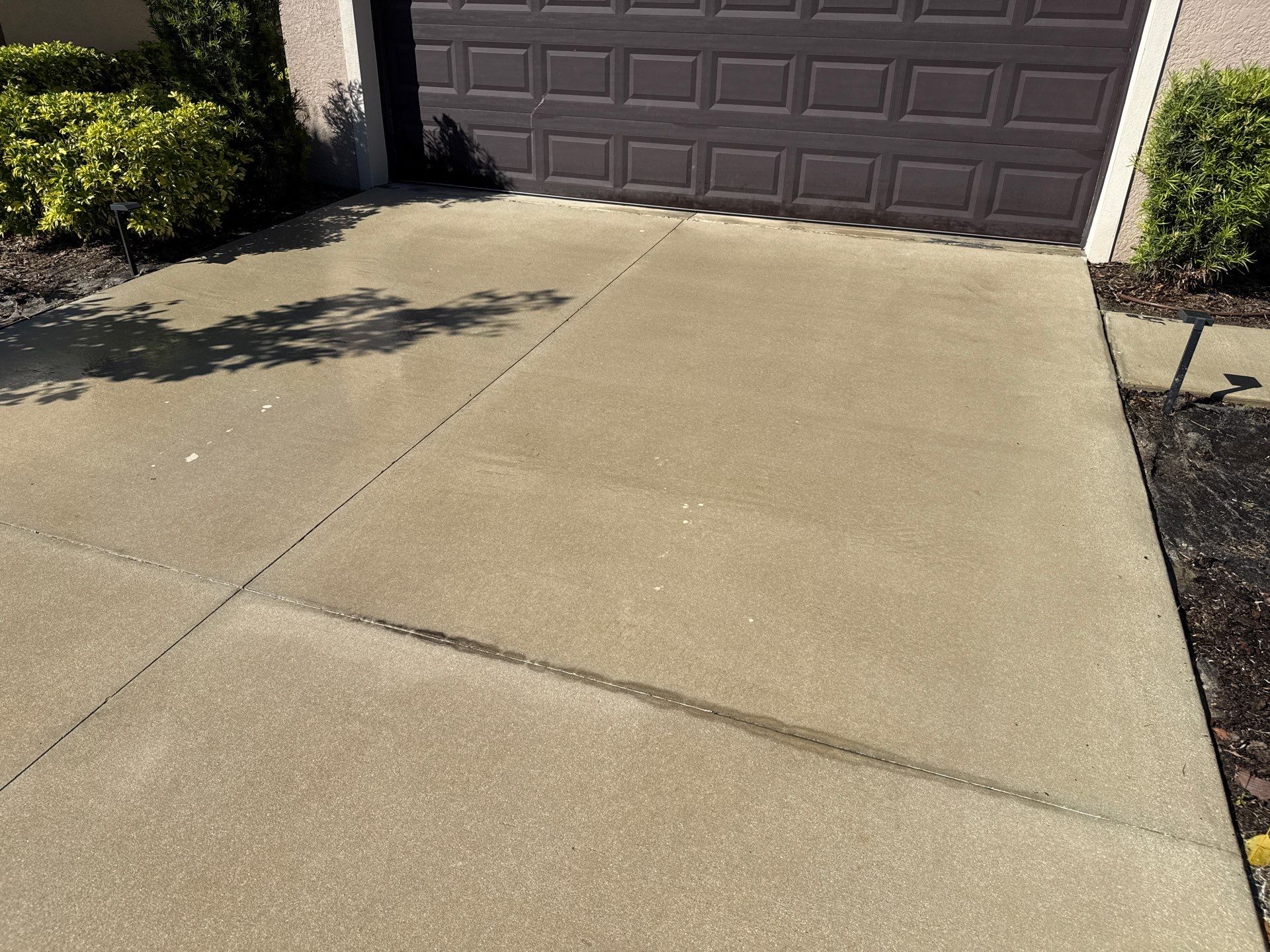 Painted Lanai Floor, Screen Enclosure, and Driveway Cleaning in Trevesta Community, Palmetto, FL by Sunshine AquaWash