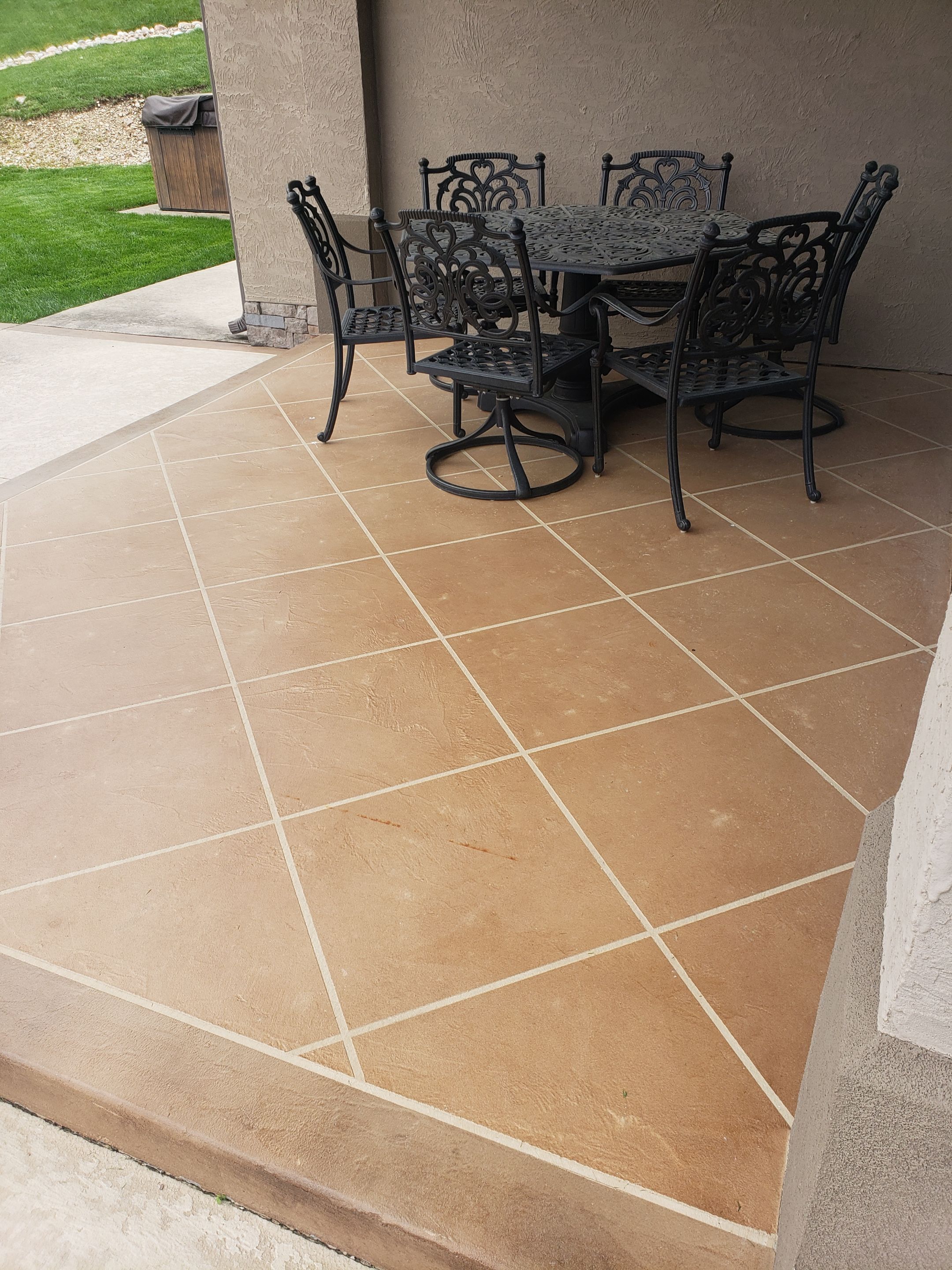 Lake Lotawana -- Front Walkway and Back Patio Tuscan Overlay by Big Red Decorative Concrete, LLC