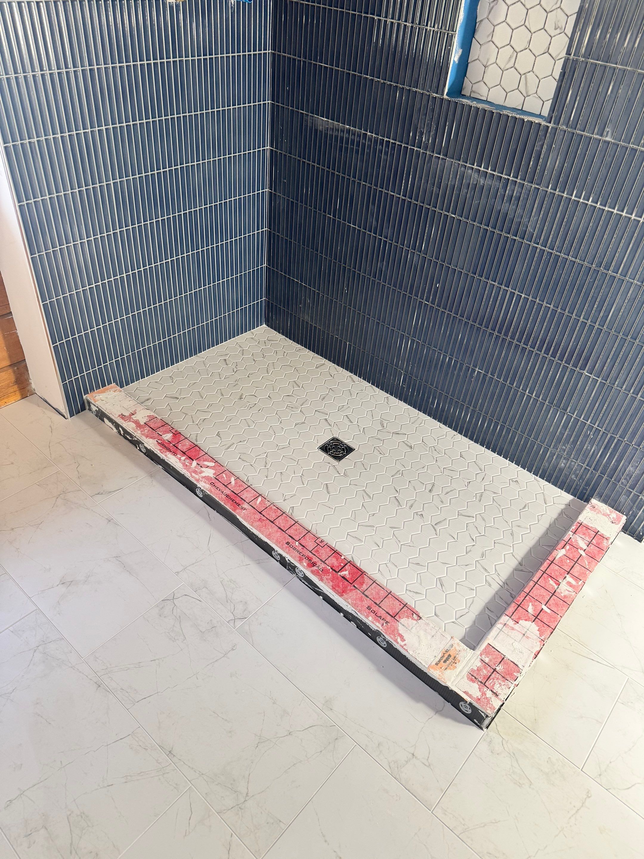 Brandt Double Bathroom Remodel by Integrity Tile and Home LLC