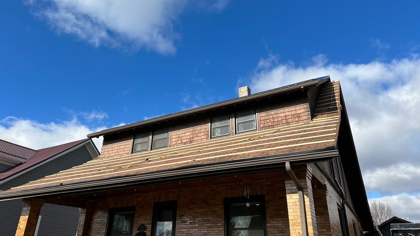 Residential Roofing Installation using Perfromance Panel Metal - Black by RoofX 
