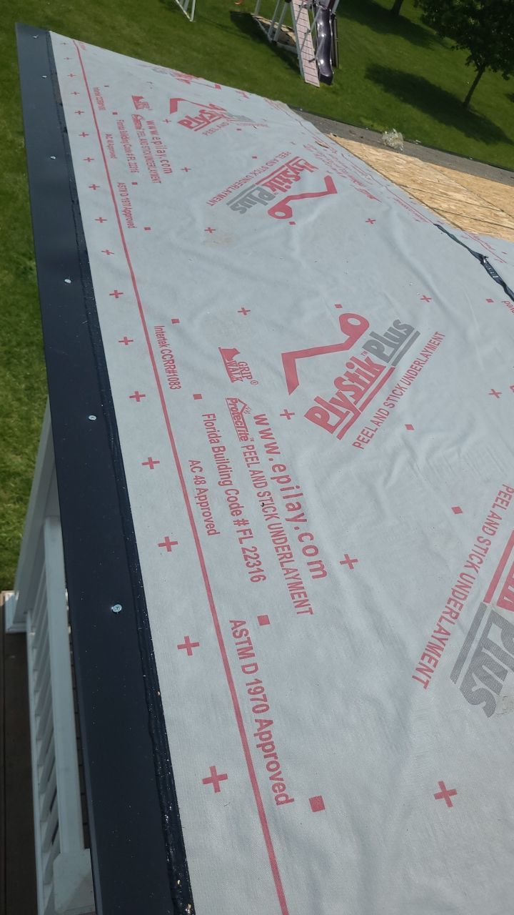Roof Damage using Certainteed Lifetime Roofing System- Moire Black Landmark Pro shingkes with shadow ridge caps. by BulletpROOF Exteriors