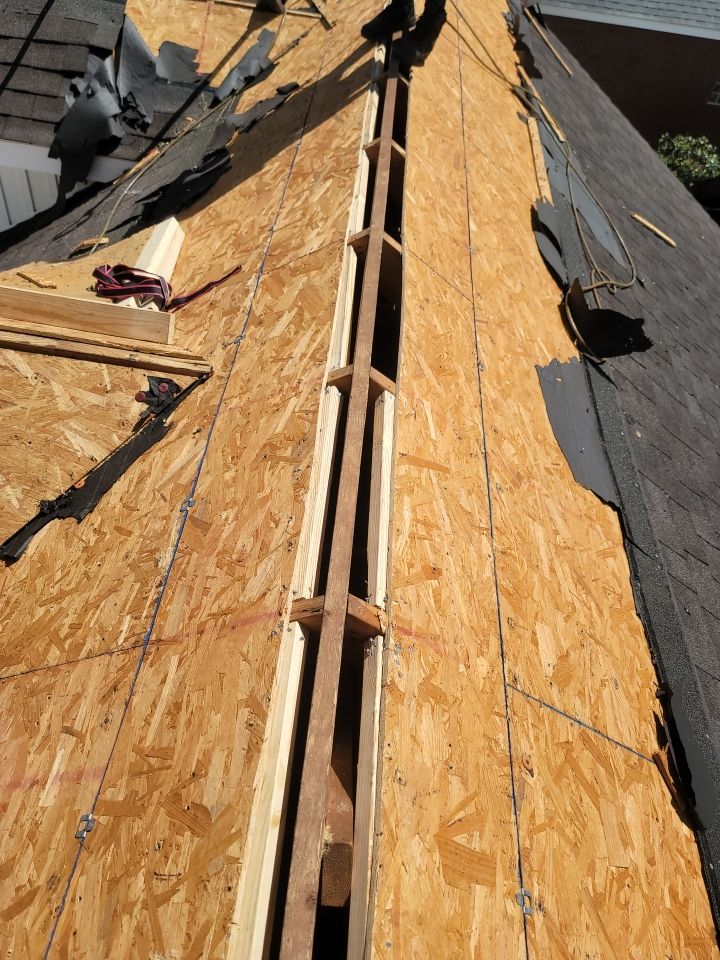Residential Roofing Installation using Roof Replacement by American Roofing & Construction LLC