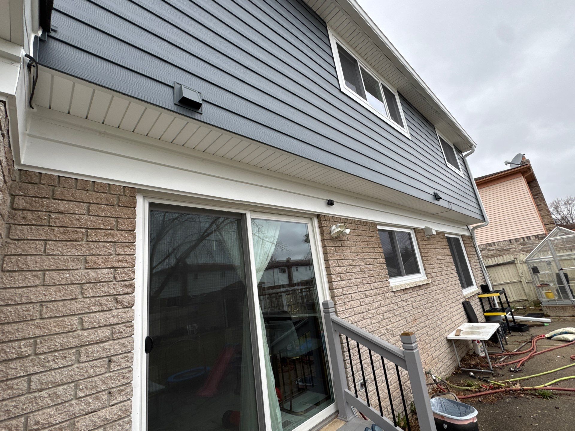 Siding Replacement using Alside Midnight Blue by 180 Contractors