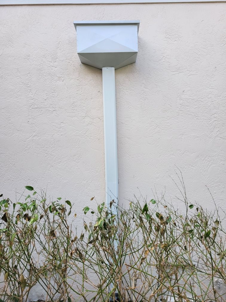 Finish Gutters for Luxury Homes in Longboat Key FL by Gutter Professors