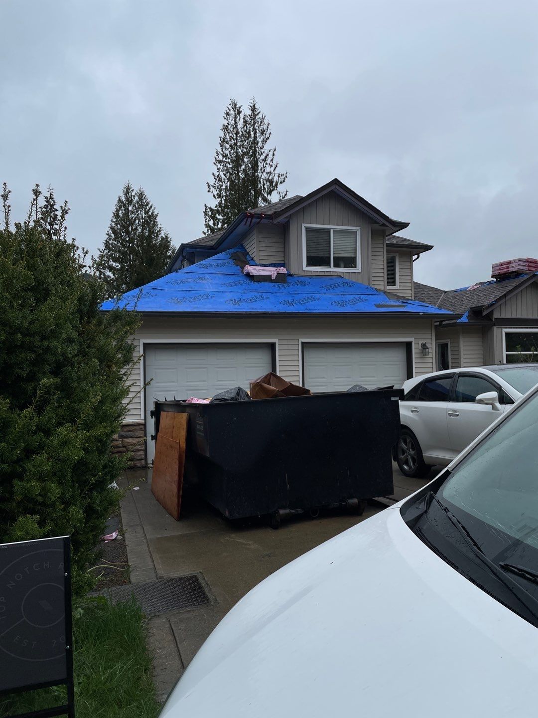 Residential Roofing Installation using OC Oakridge shingles by Top Notch Roofing Inc