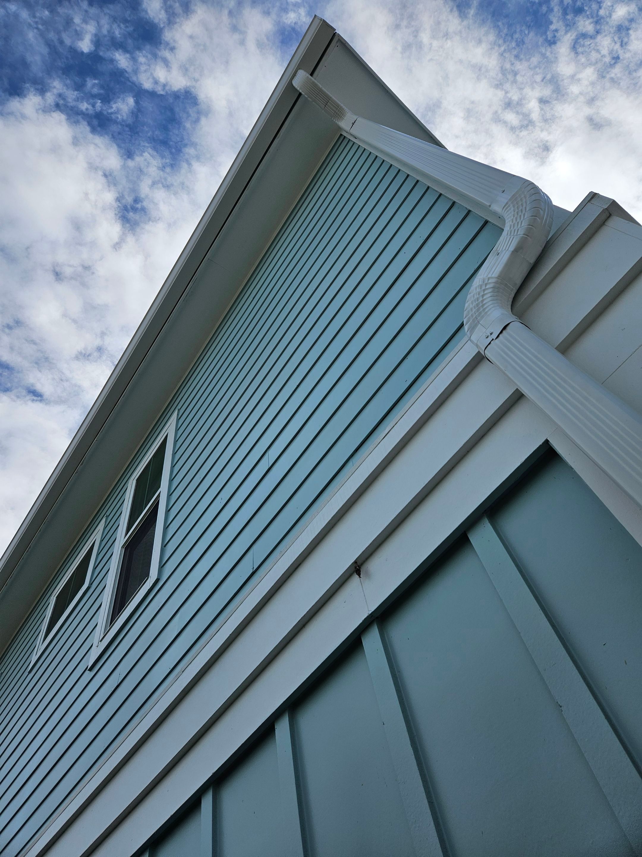 New White Seamless Gutters Installation and Downspouts, Reseal Gutters in Fort Myers Beach, FL  by Gutter Professors