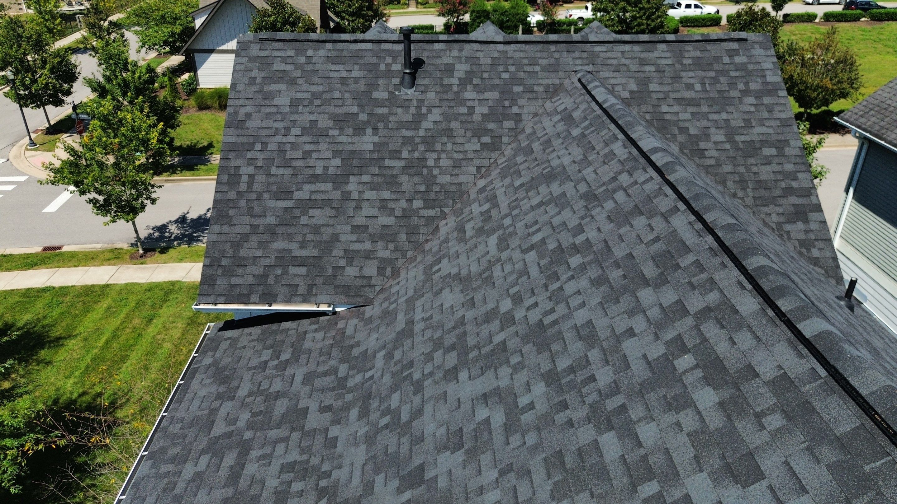 Architectural Shingle and Standing Seam Metal Roof Replacement in Franklin by Shinglesmiths Roofing