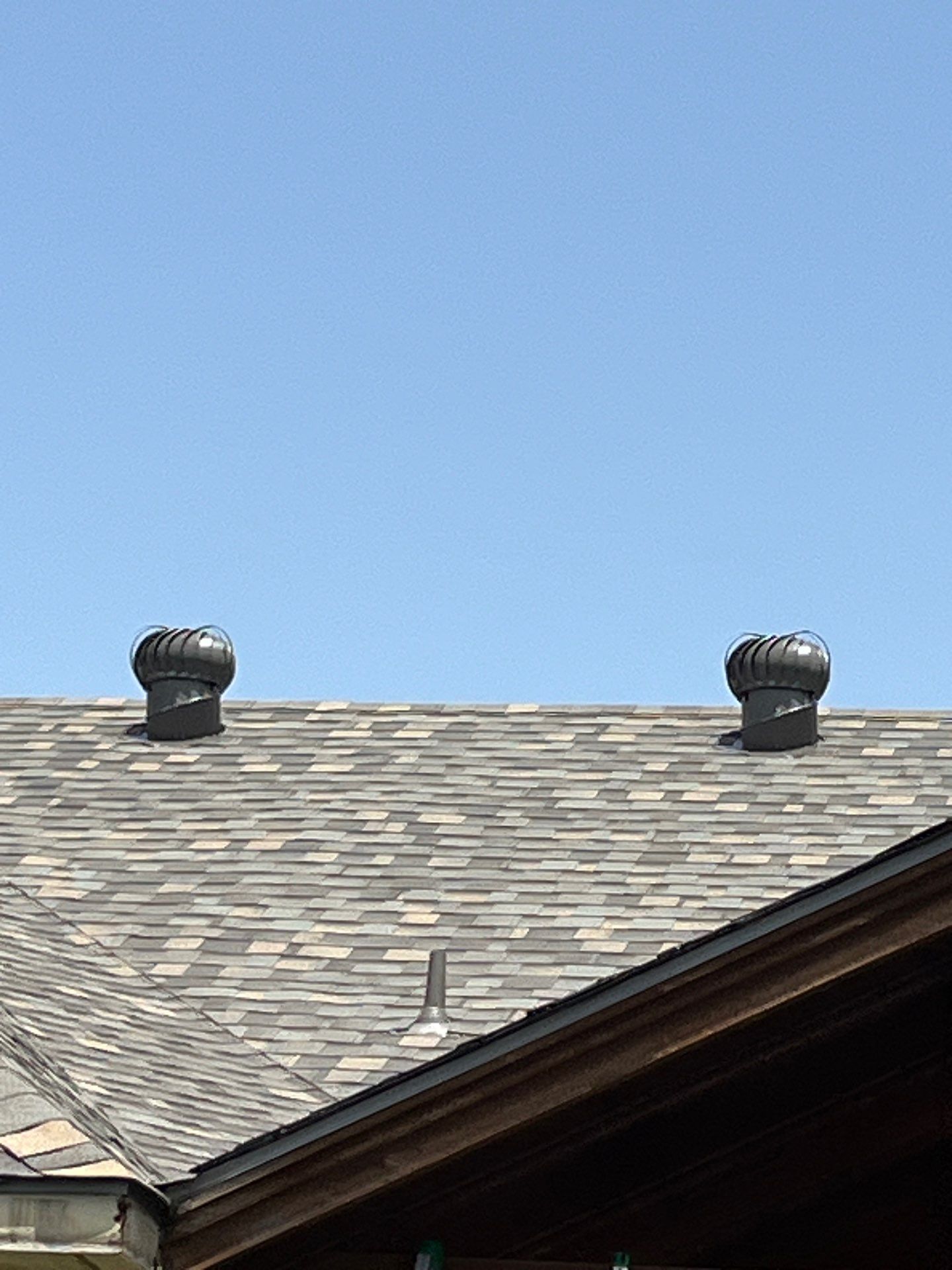 Red brick with IKO Cornerstone  by Tejas Roofworks + Restoration