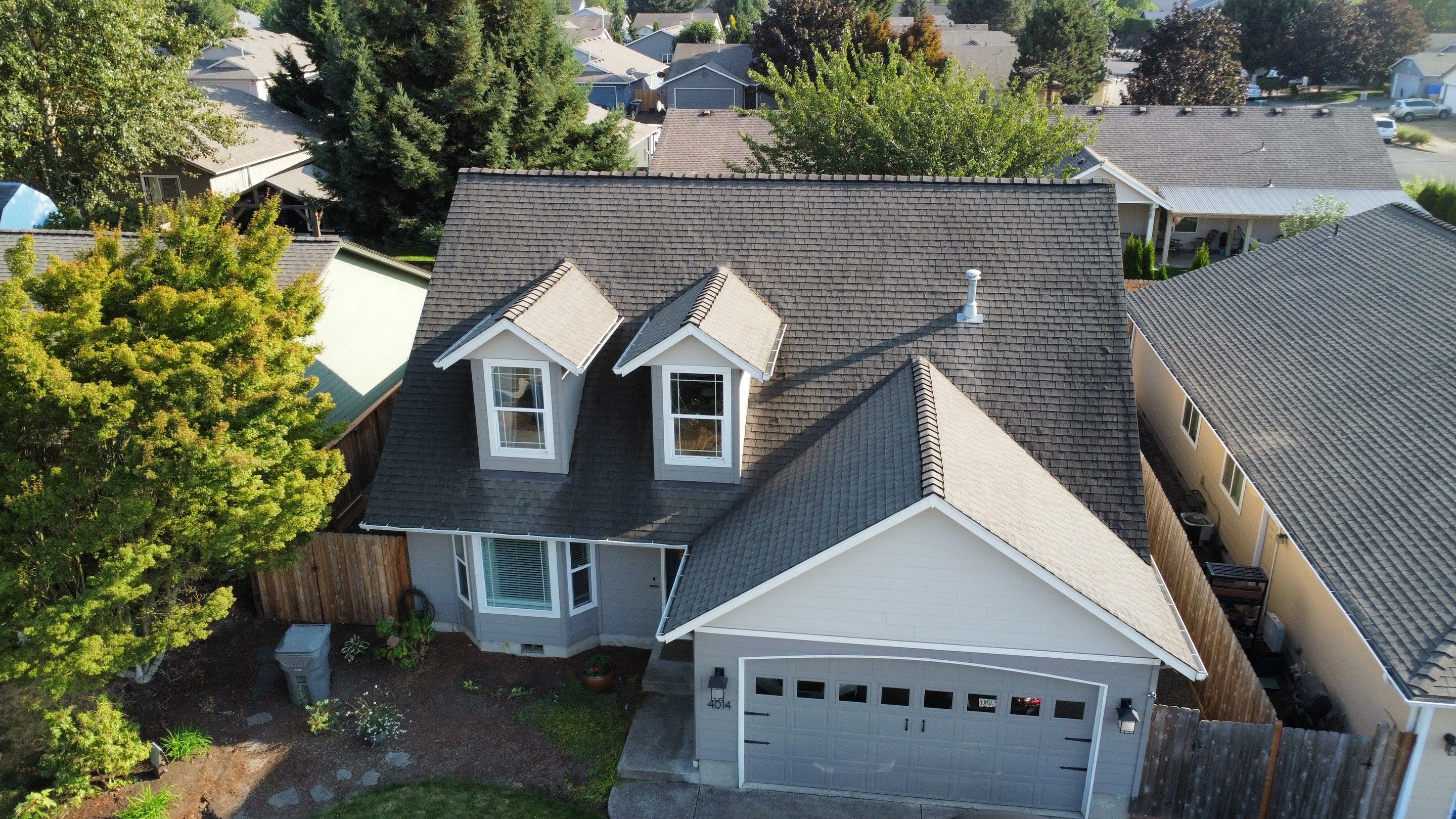 Granite Black Residential Roof Replacement by Orezona Building & Roofing Company, Inc.