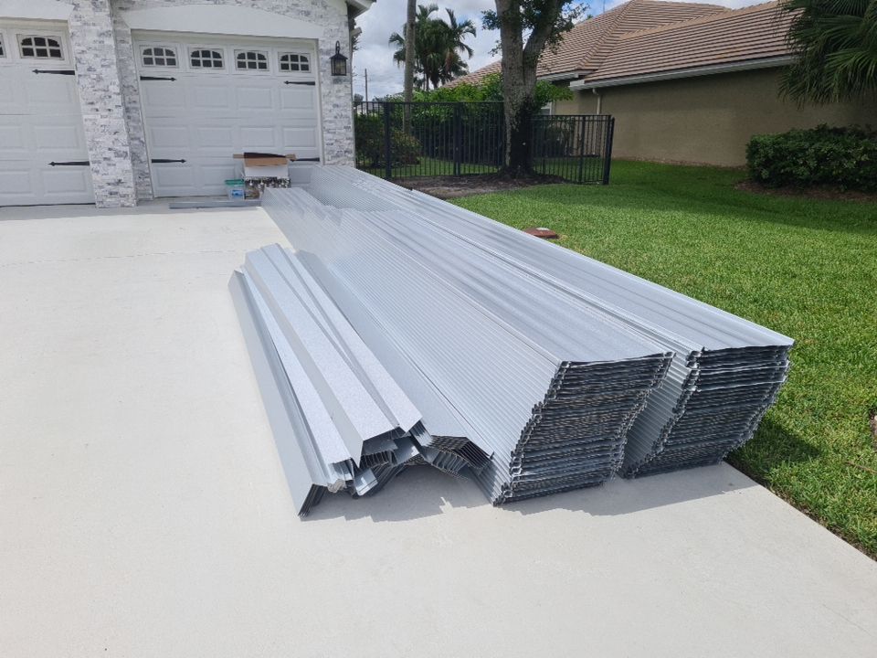 Residential Roofing Installation using 1" Nail strip metal roof by BLUES BROTHERS ROOFING