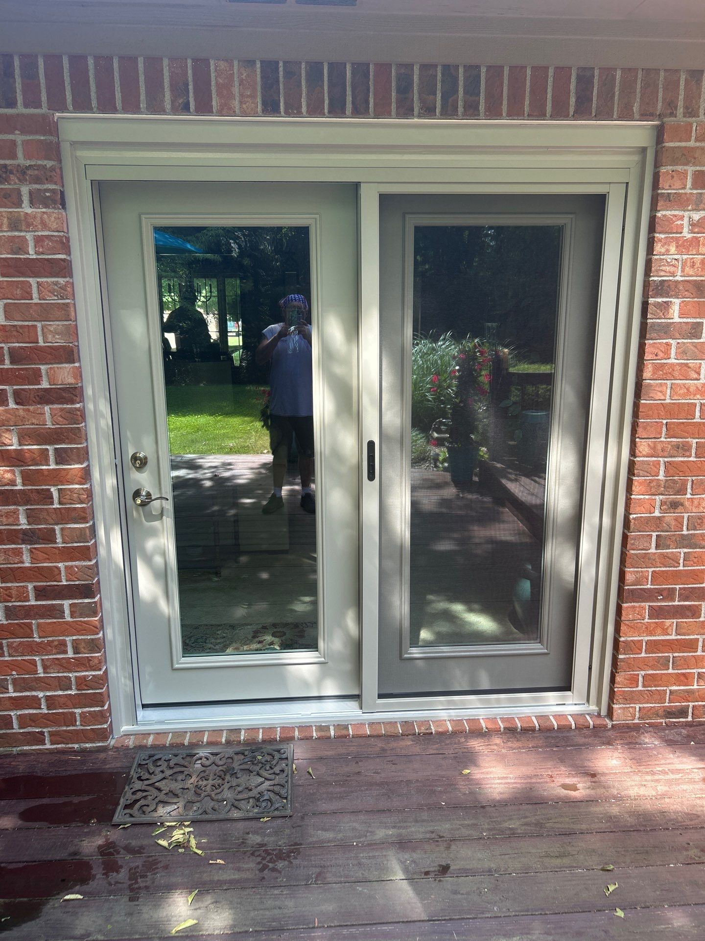 Vinyl Window and Swinging Patio Door Installation in Whiteland, Indiana by Merrifield Exteriors, LLC