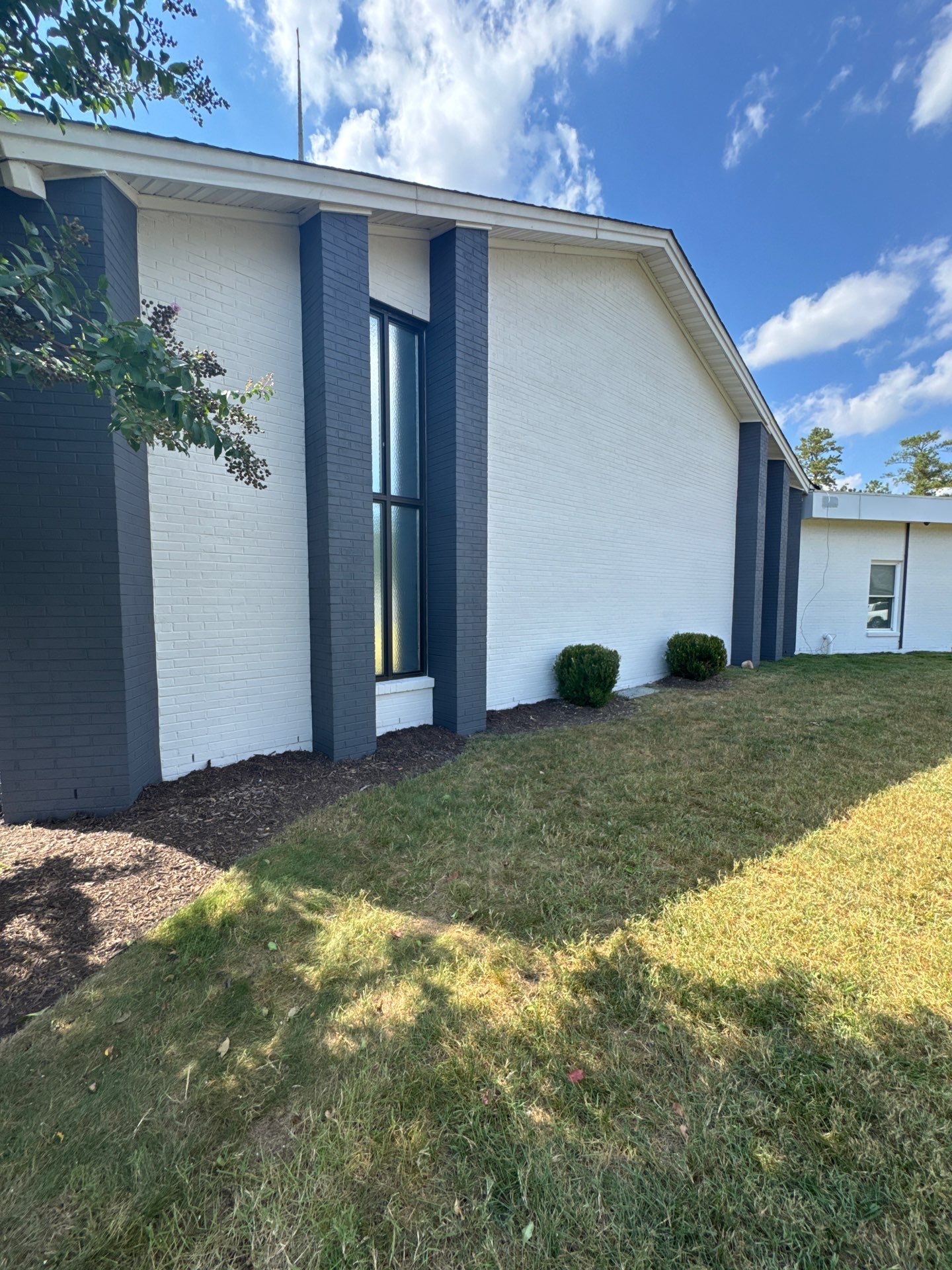Church Exterior Brick Painting with Romabio Masonry Flat by Highfill Painting