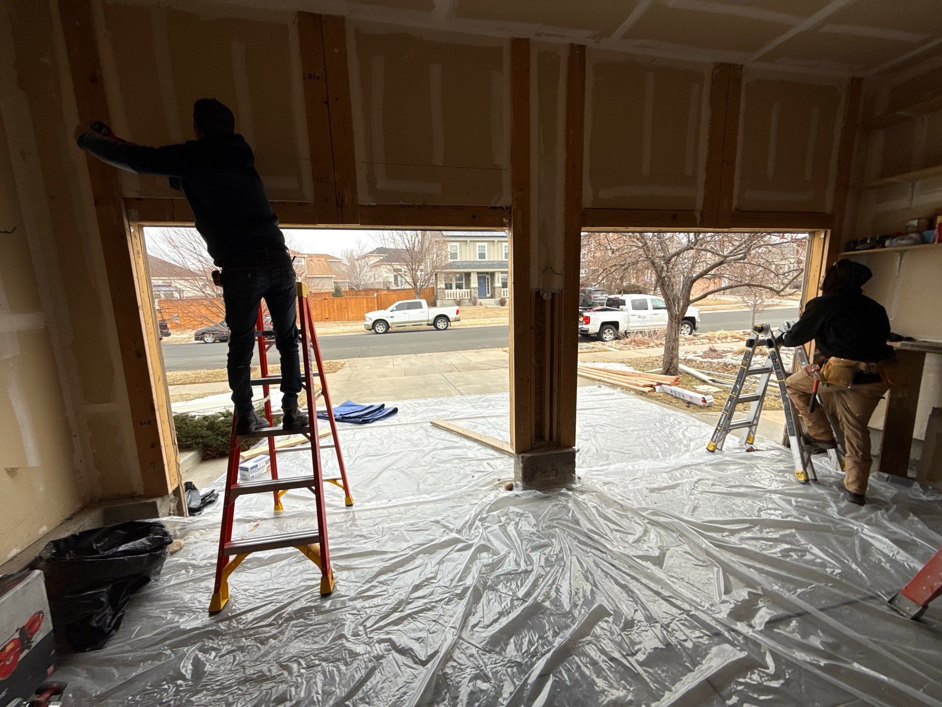 Garage door conversion by David & Goliath Contracting 