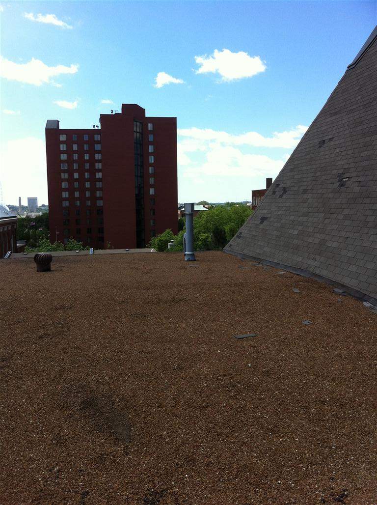 Historic Building ROOF REPLACEMNT with GAF TruSlate  on steep slop and Versico 60mil TPO on flat roof by Gorilla Exteriors Contracting, LLC
