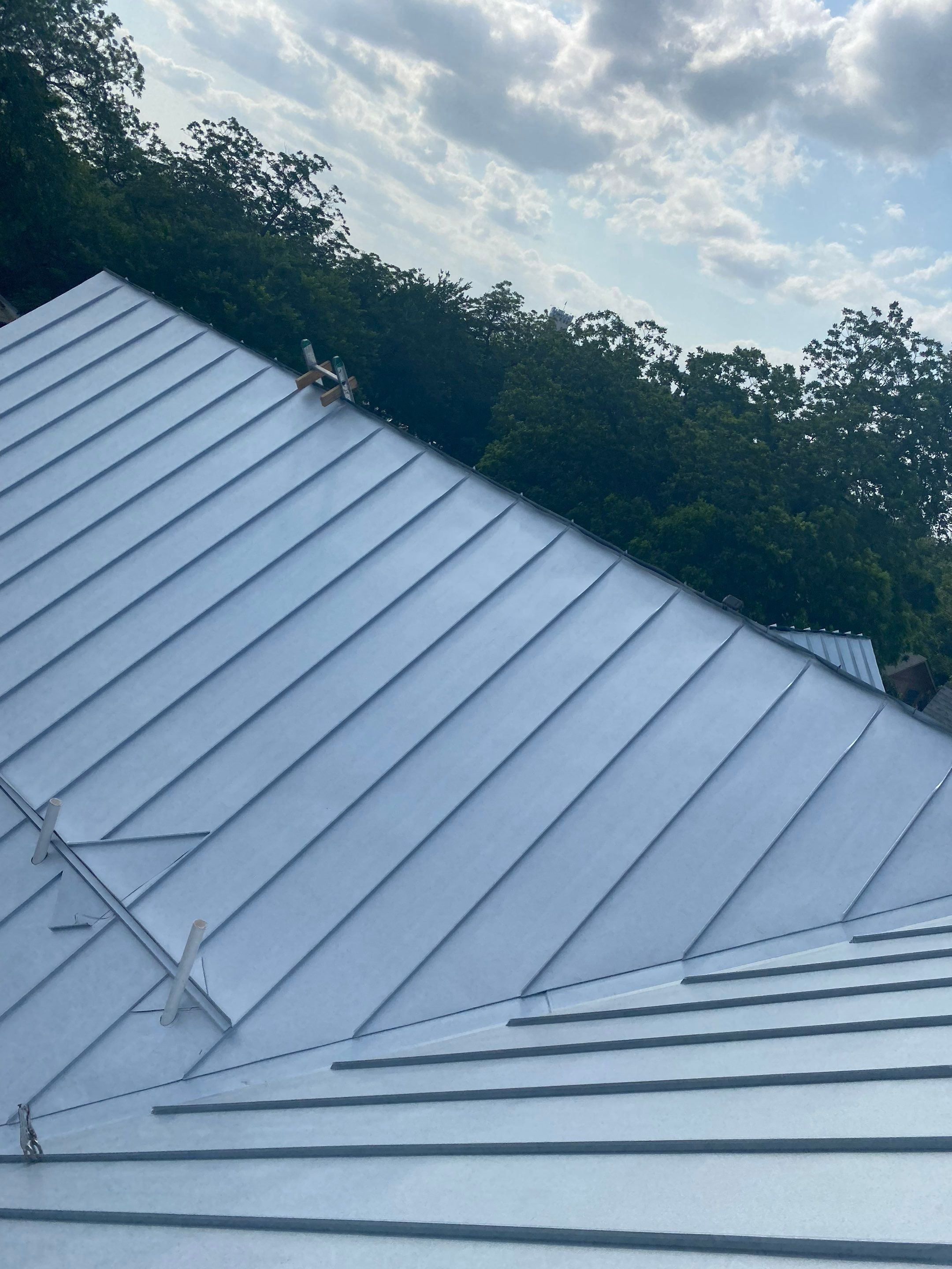 Residential Metal Roof Installation using McElroy Metal by Premier Roofing and Contracting