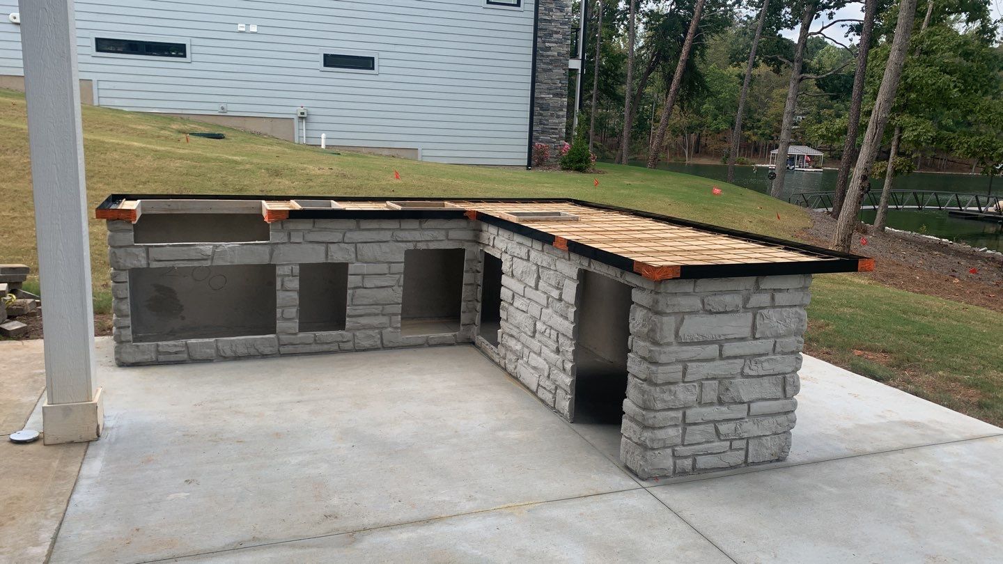 Outdoor Kitchen on Lake Keowee by Xtreme Concrete Services