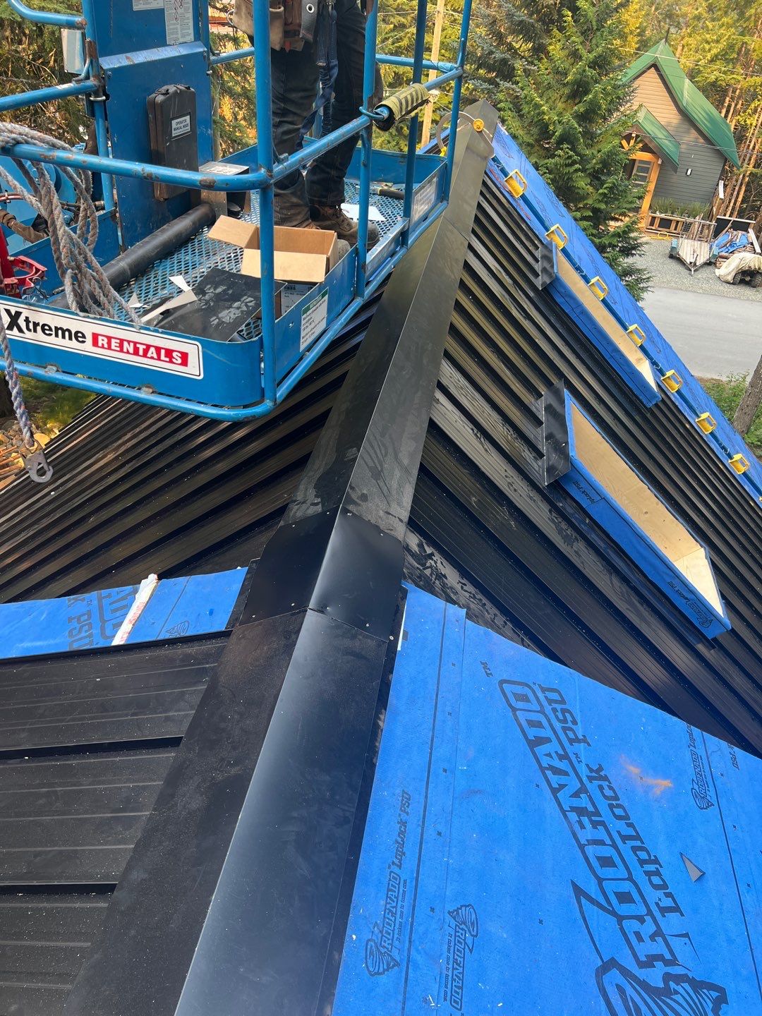 Residential ReRoofing Installation using 12" Prolok metal  by Top Notch Roofing Inc