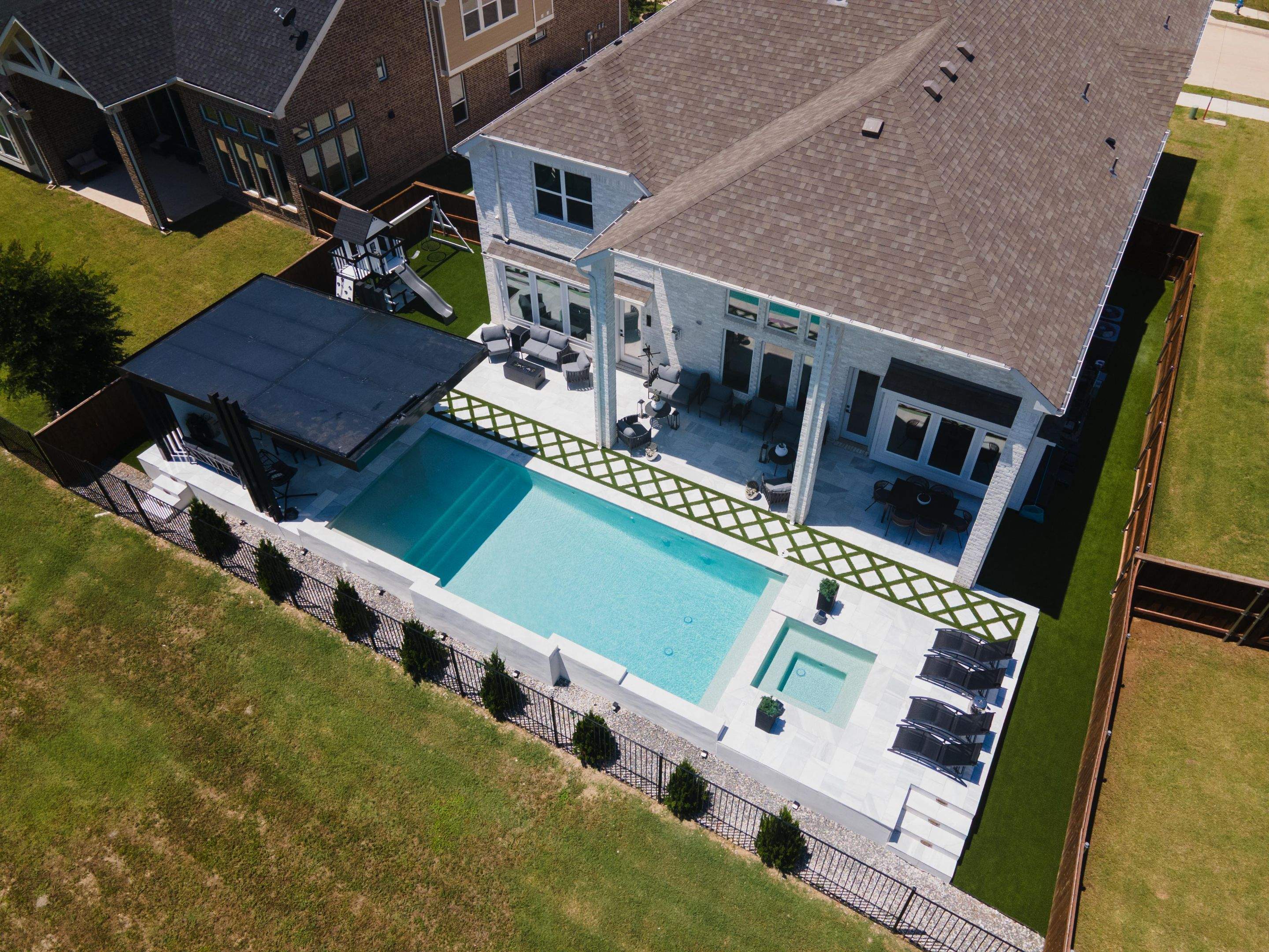 Large Pool and Spa with Rain Descent by Pinnacle Pools and Spas - DFW