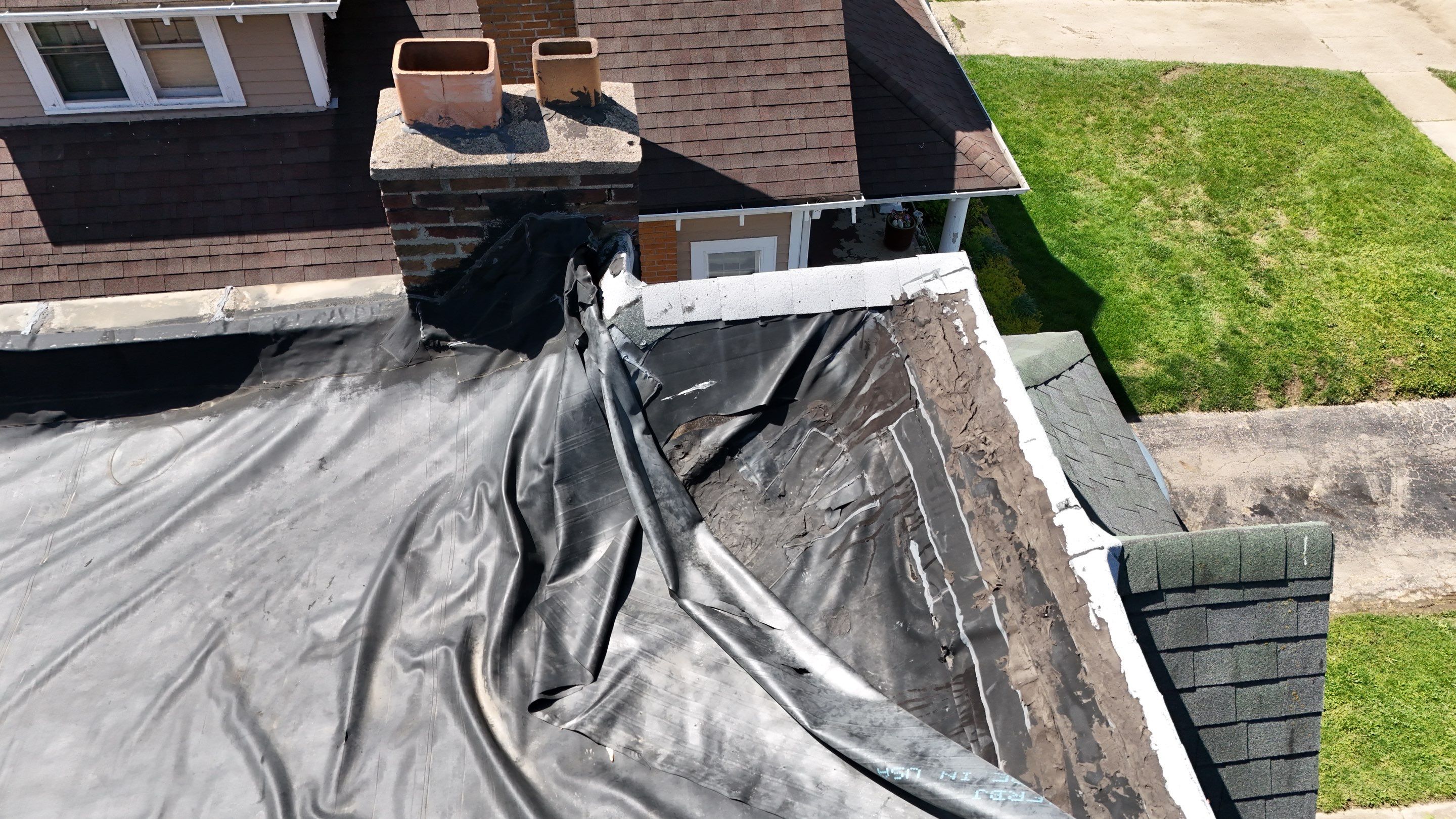 Commercial Flat Roof Replacement by Nitro Roofing and Construction