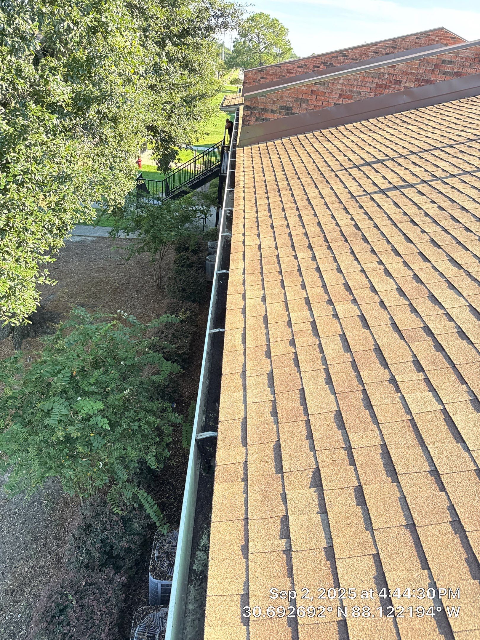 HOA gutter cleaning after photo.