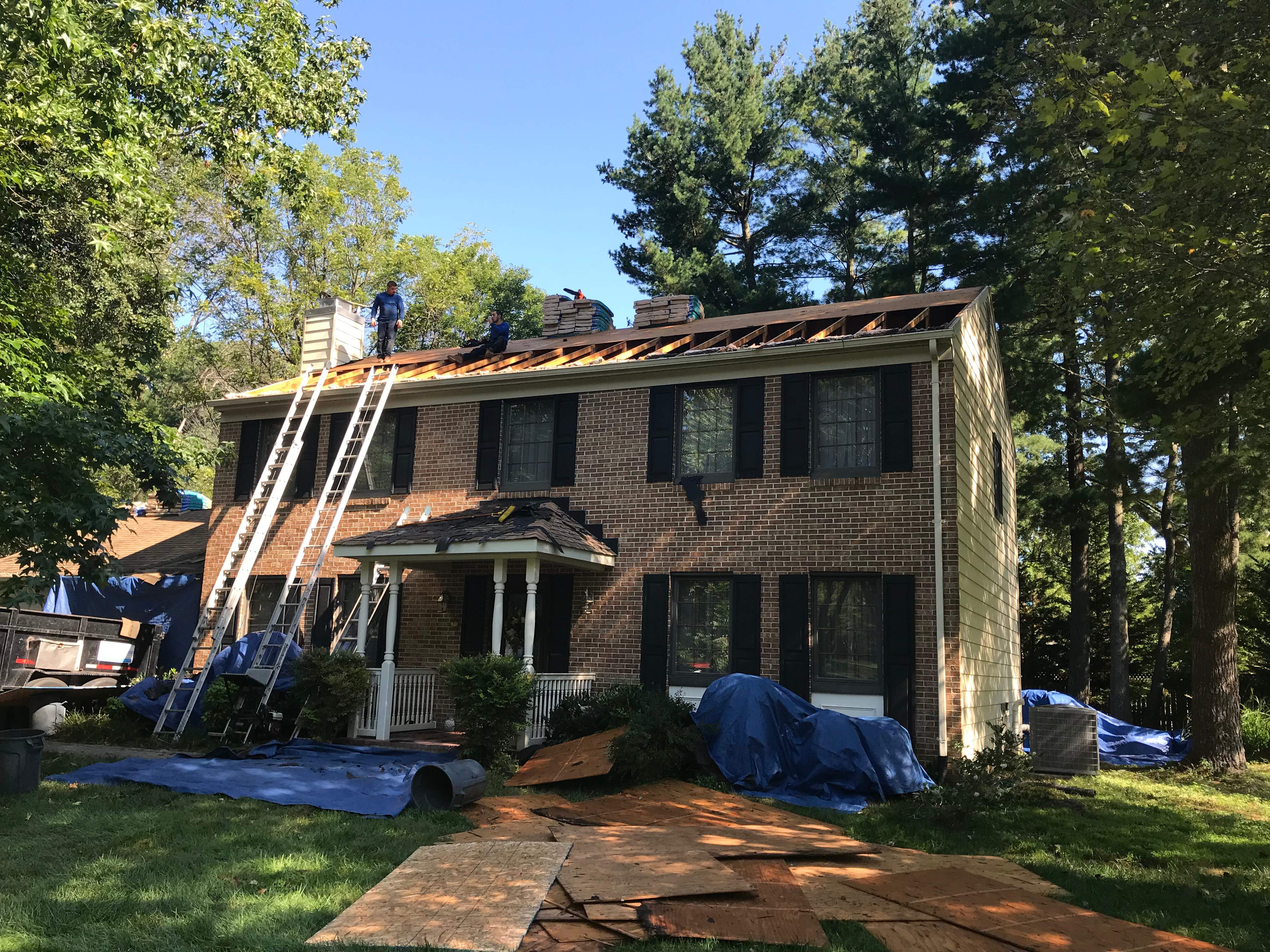 Residential Roofing Installation using Landmark Shingles Color Weatherwood by Alpha Design Services