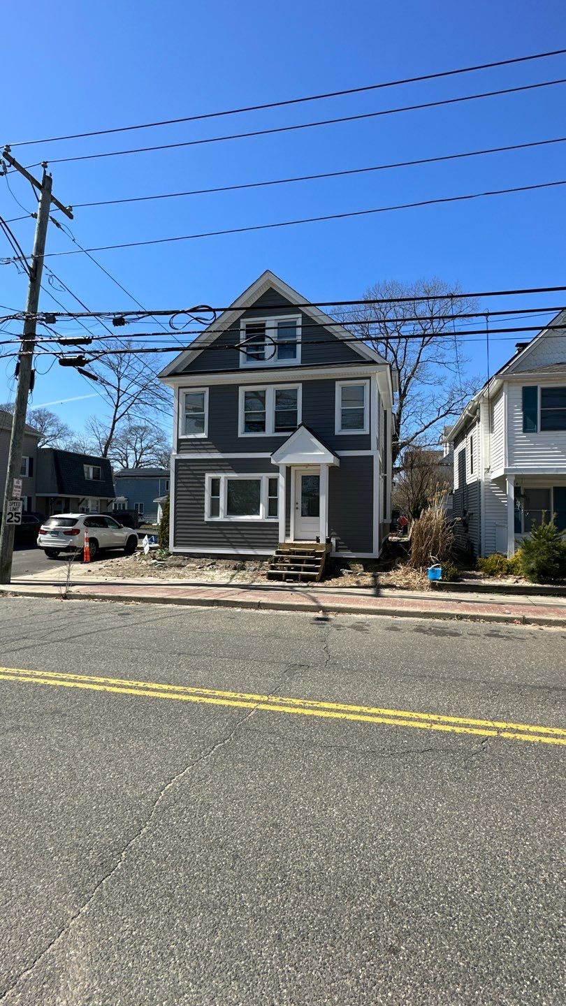 Siding Installation using Hardie Plank Aged Pewter by A Plus Exterior